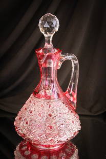 Cranberry Cut to Clear Glass Claret Decanter: Amazing cranbery cut to clear glass claret or decanter in Daisy & Button pattern complete with faceted stopper. Piece stands 10 1/4" tall.