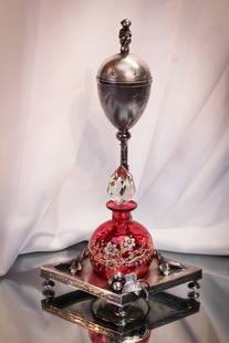 Meriden Victorian Silverplate Cranberry Vanity Cologne Perfume Castor: Beautiful signed Meriden silverplate ornate perfume castor complete with cranberry enameled bottle and faceted stopper. Lovely.