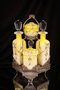Fantastic Victorian Aurora Silverplate Victorian Vanity Cologne Bottle Castor Set: Folks, one absolutely amazing set. Holder is signed Aurora silverplate. Bottles are attributed to Harrach glass. In canary yellow satin glass with enameled flowers decoration. Fine set. Just amazing.