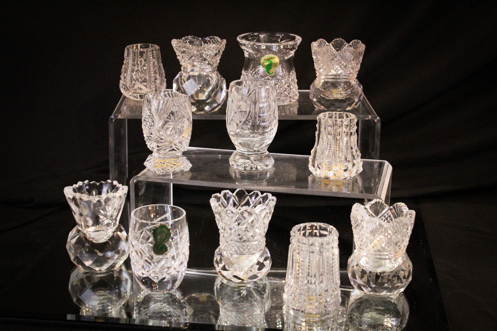 12 pc Lot Cut Glass Toothpick Holders: Great offering of variana in cut glass toothpick holders including a Waterford example. Tallest measures 3".