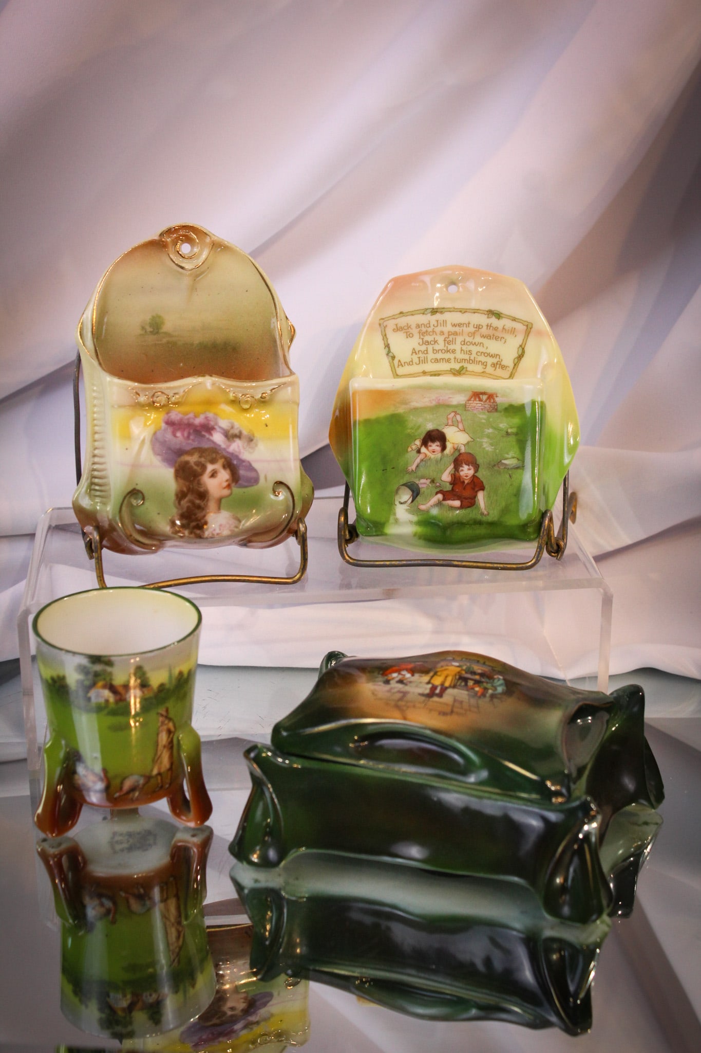 4 pc Lot Royal Bayreuth Porcelain Items: Selections in Royal Bayreuth comprised by two match holders, a lidded soap box, and finished by a toothpick holder. Each uniquely decorated.