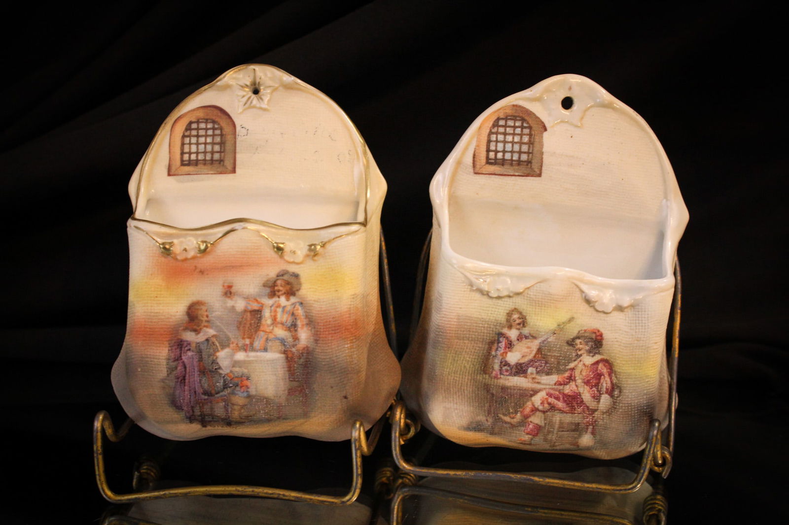 2 pc Lot Royal Bayreuth Porcelain Match Holders: Two fine examples of signed Royal Bayreuth match holders make up this offering. One as nice as the next. Largest measures 4 1/2" tall.