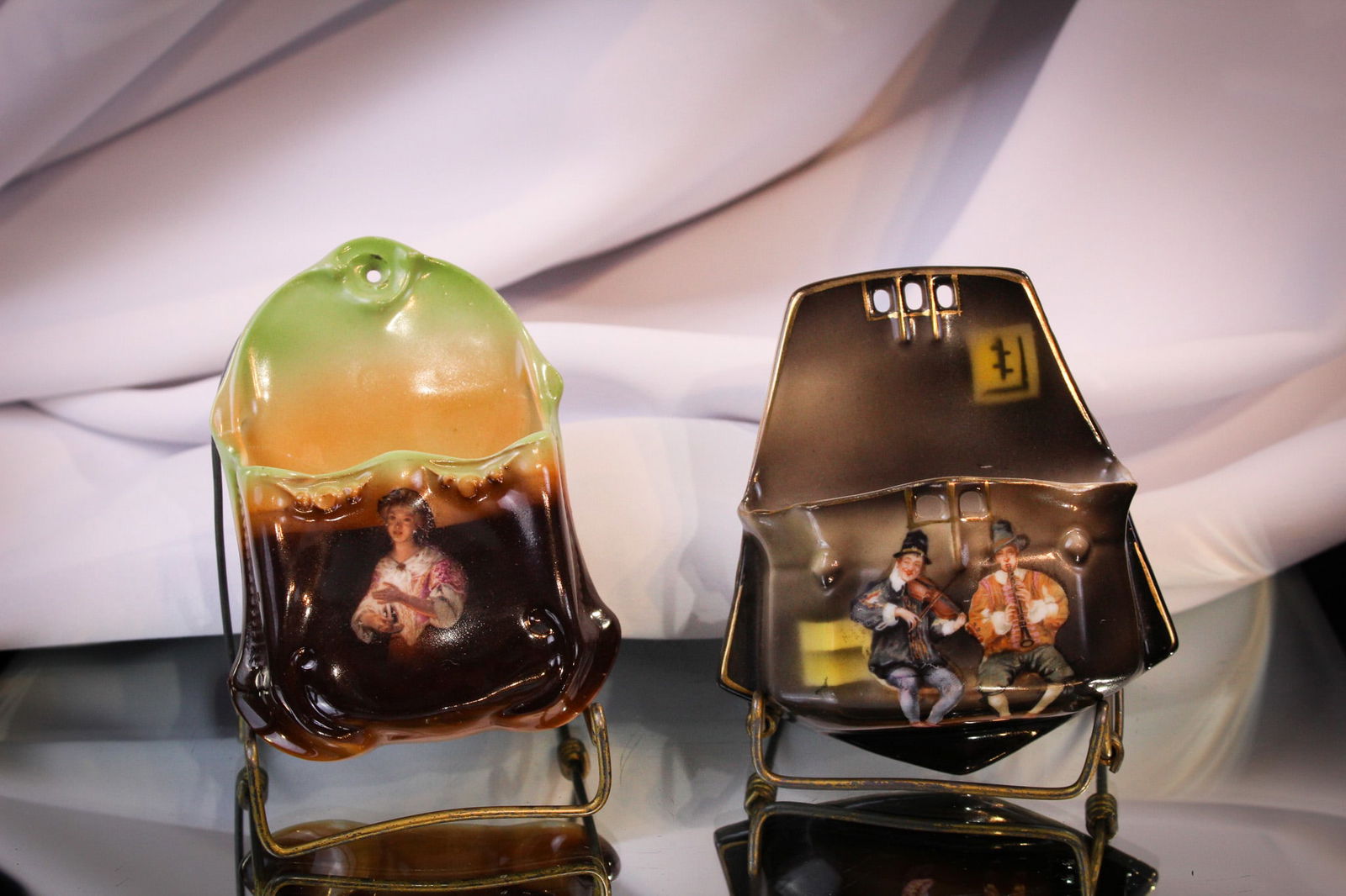 2 pc Lot Royal Bayreuth Porcelain Match Holders: Two great examples unique in decoration of Royal bayreuth match holders. Largest measures 4 1/2" tall.