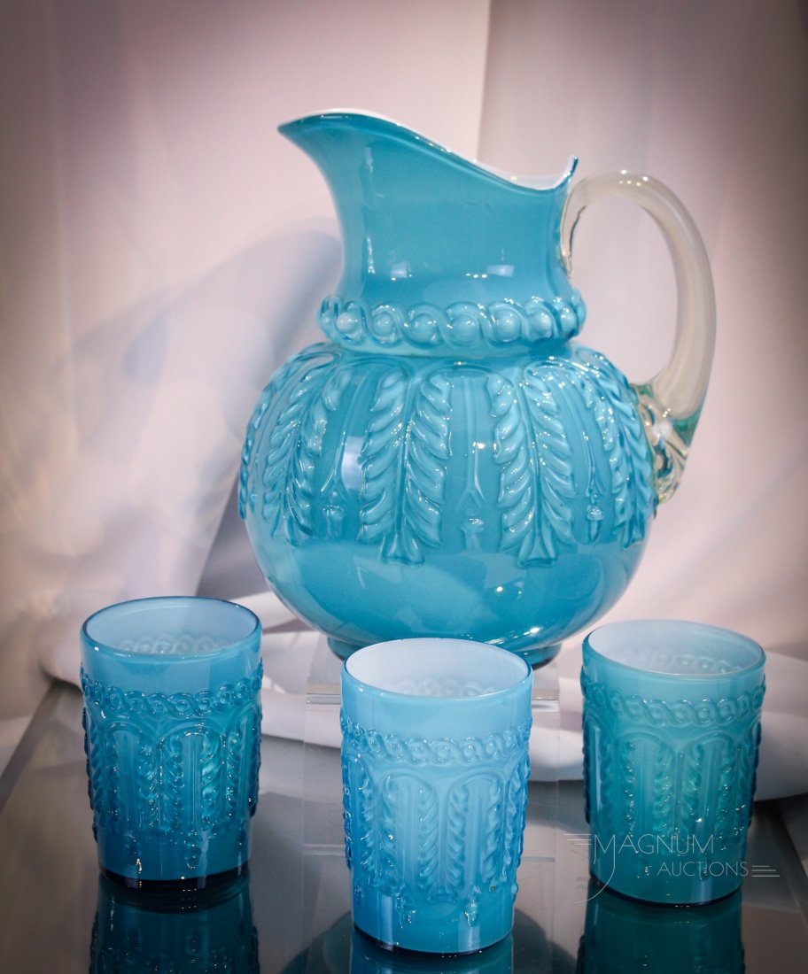 Northwood Blue Leaf Umbrella Victorian Water Set: Brilliant blue Northwood Leaf Umbrella pattern Victorian water set. Set is comprised of water pitcher and three tumblers. Tallest measures 8 1/2".