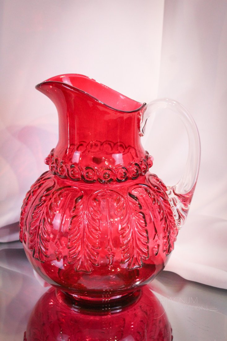 Northwood Cranberry Leaf Umbrella Victorian Pitcher: Deep rich cranberry coloring makes this a stand out piece of Northwood Leaf Umbrella for your collection. This pitcher has just that. It stands a whopping 8 1/2" tall.