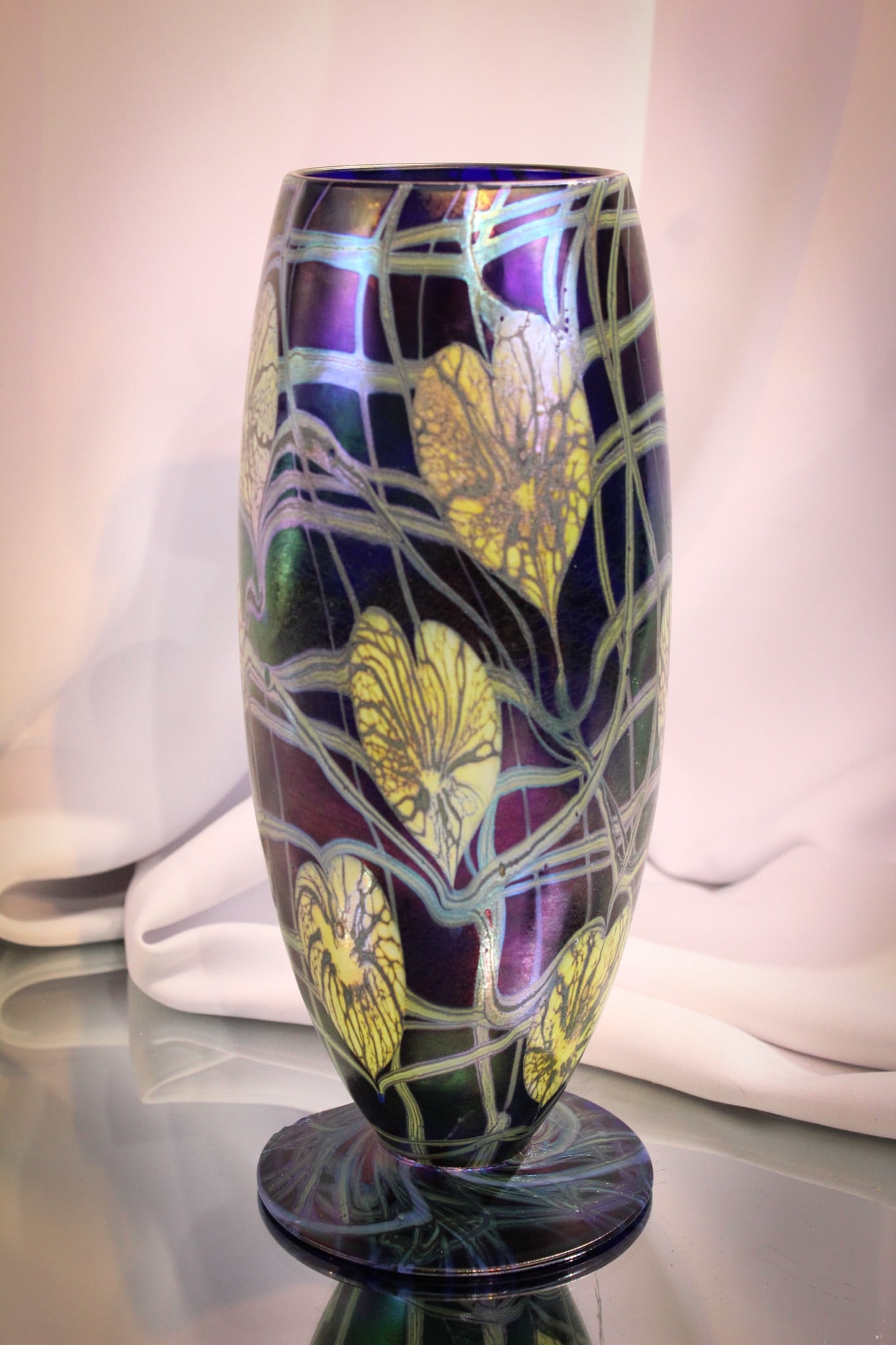Imperial Freehand Lead Lustre Lily Pad & Vine Art Glass Vase: This piece is from the private collection of Ernest L. Albanese Jr. Extremely rare decoration is found on this blue irridescent Imperial art glass vase. Wonderful Lily Pad & Vine decoration encompasse