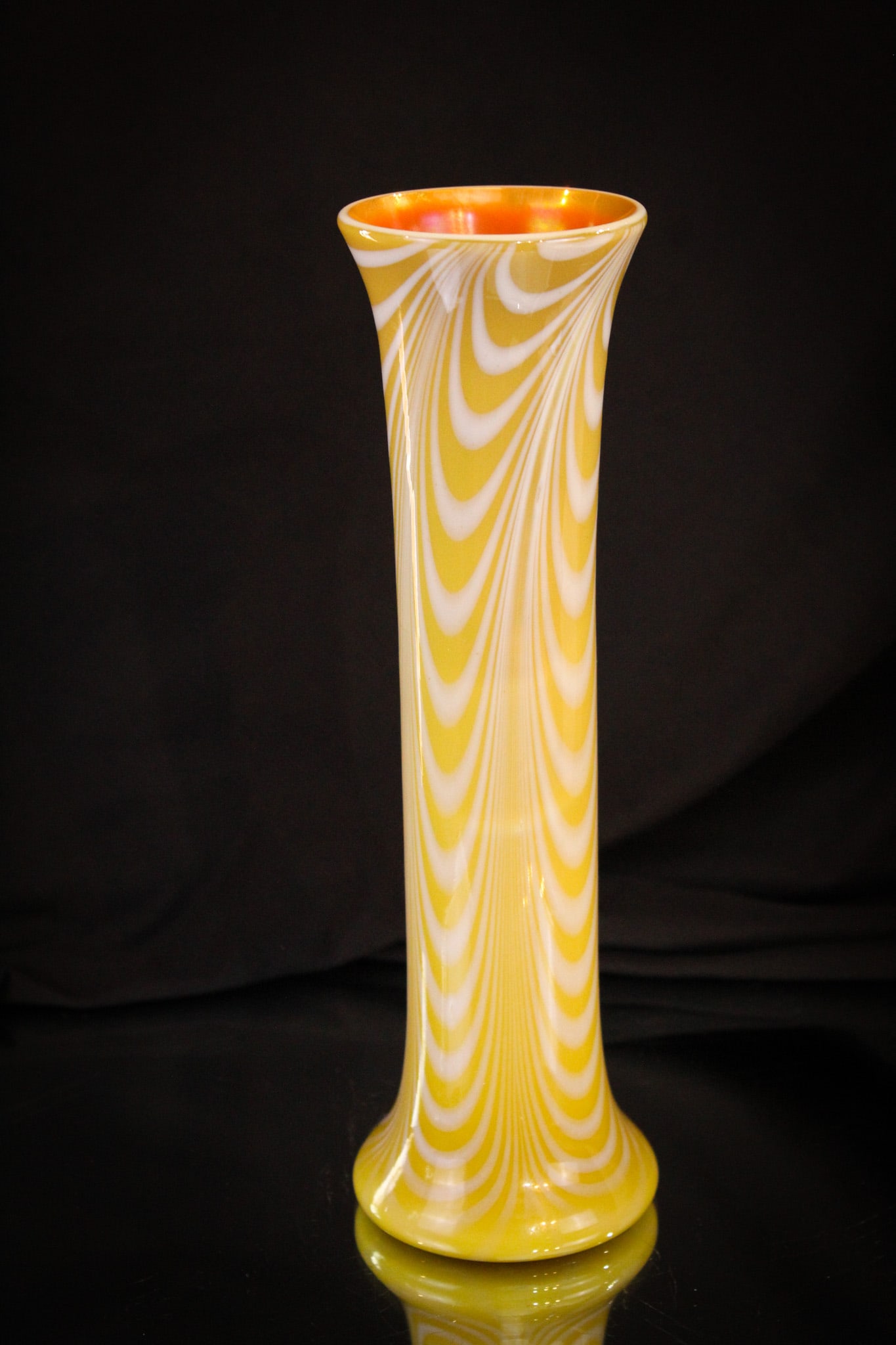 Imperial Freehand Lead Lustre Festoon Art Glass Vase: This piece from the private collection of Ernest L. Albanese Jr. Classic Imperial freehand lead lustre art glass vase in oatmeal & cream colored festoon design with orange interior. Vase measures 8 1/