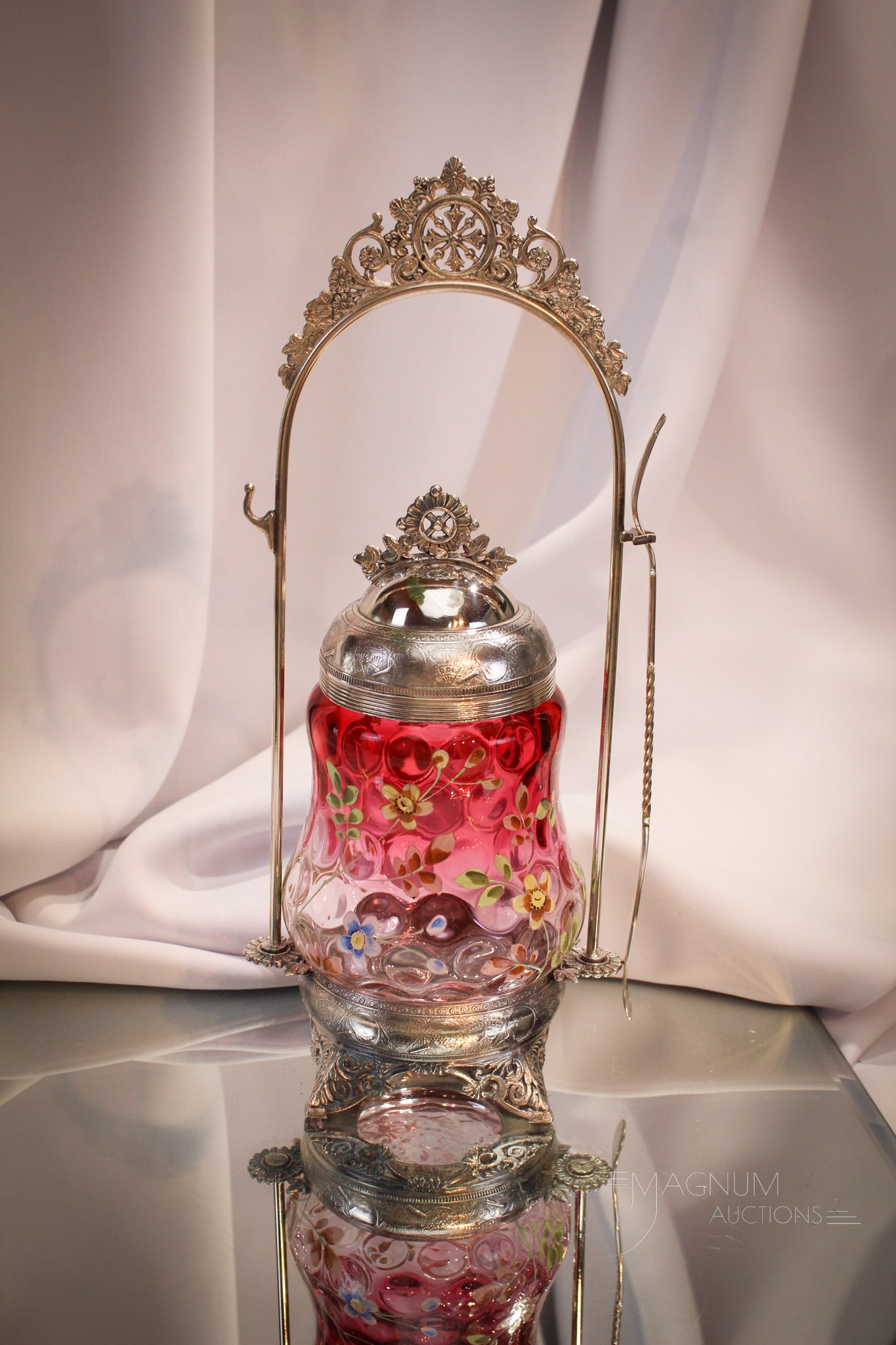 Middletown Victorian Silverplate Cranberry Pickle Castor: Fine offering of a Victorian signed Middletown pickle castor complete with cranberry rubina enameled glass insert. Complete it measures 12 1/2" tall.