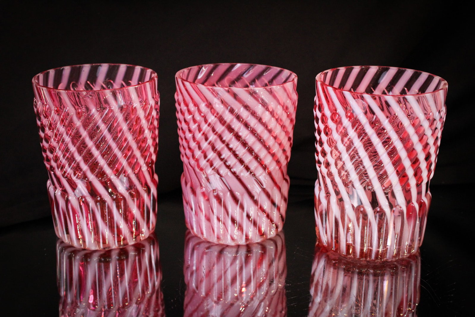 3 pc Lot Northwood Cranberry Opalescent Chrysanthemum Swirl Tumblers: Great trio of cranberry opalescent Northwood Chrysanthemum Base Swirl tumblers. Each a beauty of an example.