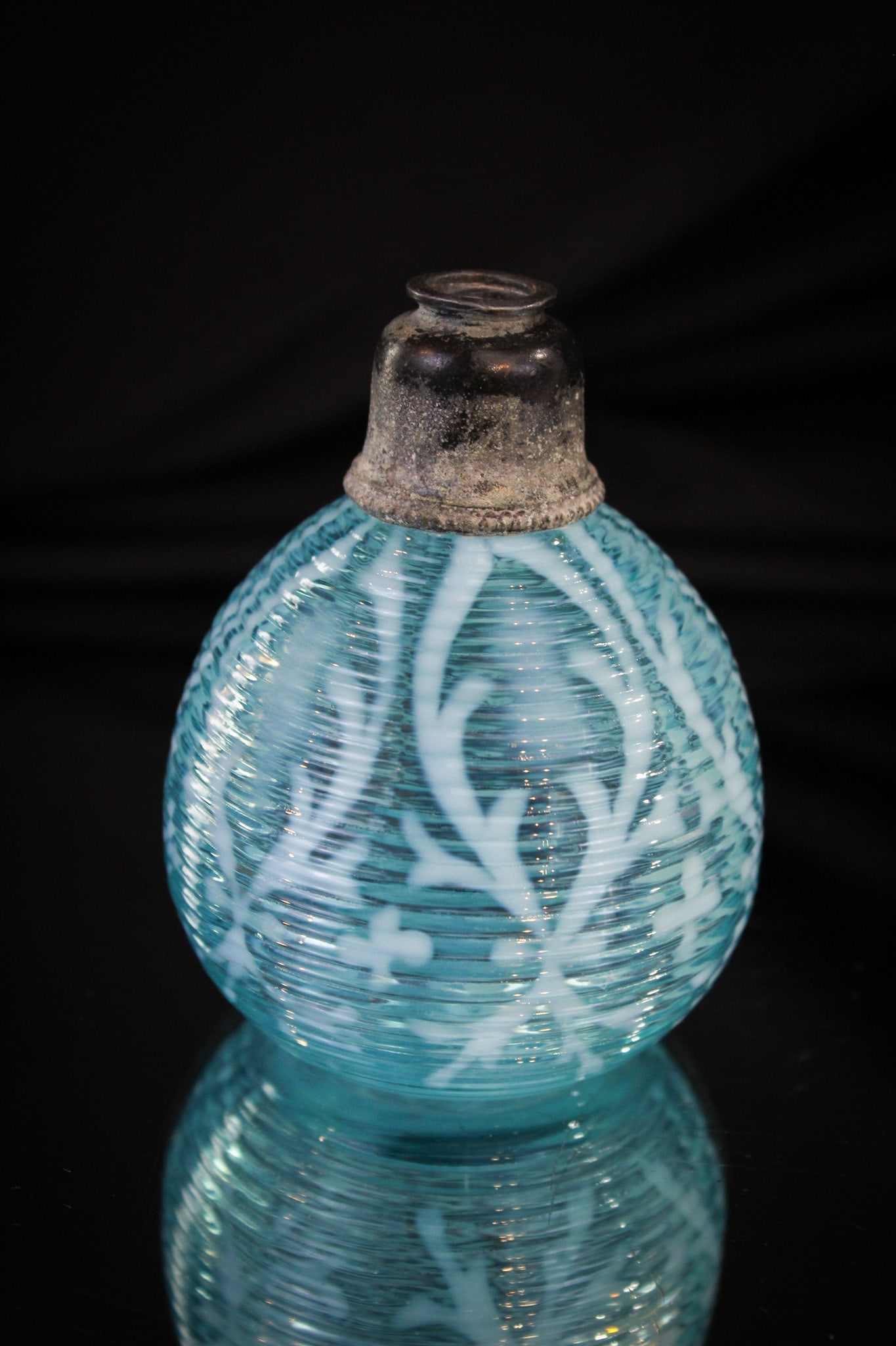 Rare Northwood Spanish Lace Threaded Perfume Atomizer: What a rare little charmer this one is. Not many around, we dare say! This little atomizer in blue opalescent Spanish Lace pattern is quite unique. Original metal collar. Exterior has a horizontal thr