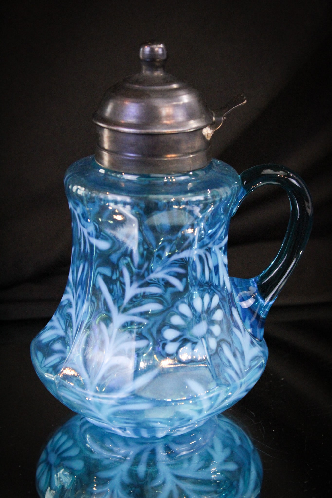 Scarce Blue Opalescent Daisy Fern 9-Panel Victorian Syrup Pitcher: Not one you see often, folks! Take note of this honey. Great Victorian syrup pitcher in the 9-Panel mold in the Daisy & Fern pattern. It's a toughie. Measures 6" tall.