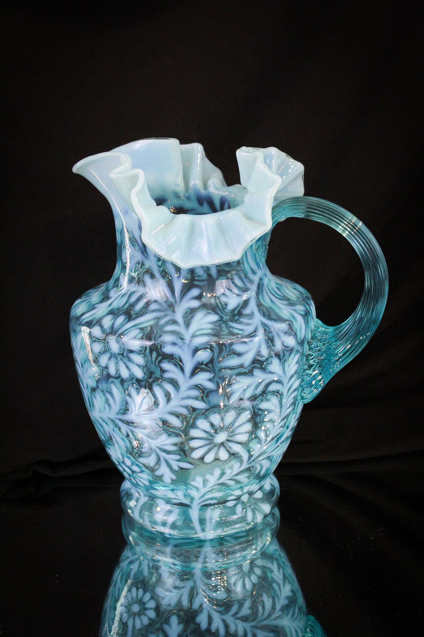 Blue Opalescent Northwood Daisy & Fern Victorian Pitcher: Nice showy example of blue opalescent Victorian glass in the form of a pitcher by Northwood. One fine example! It stands 9 1/4" tall.