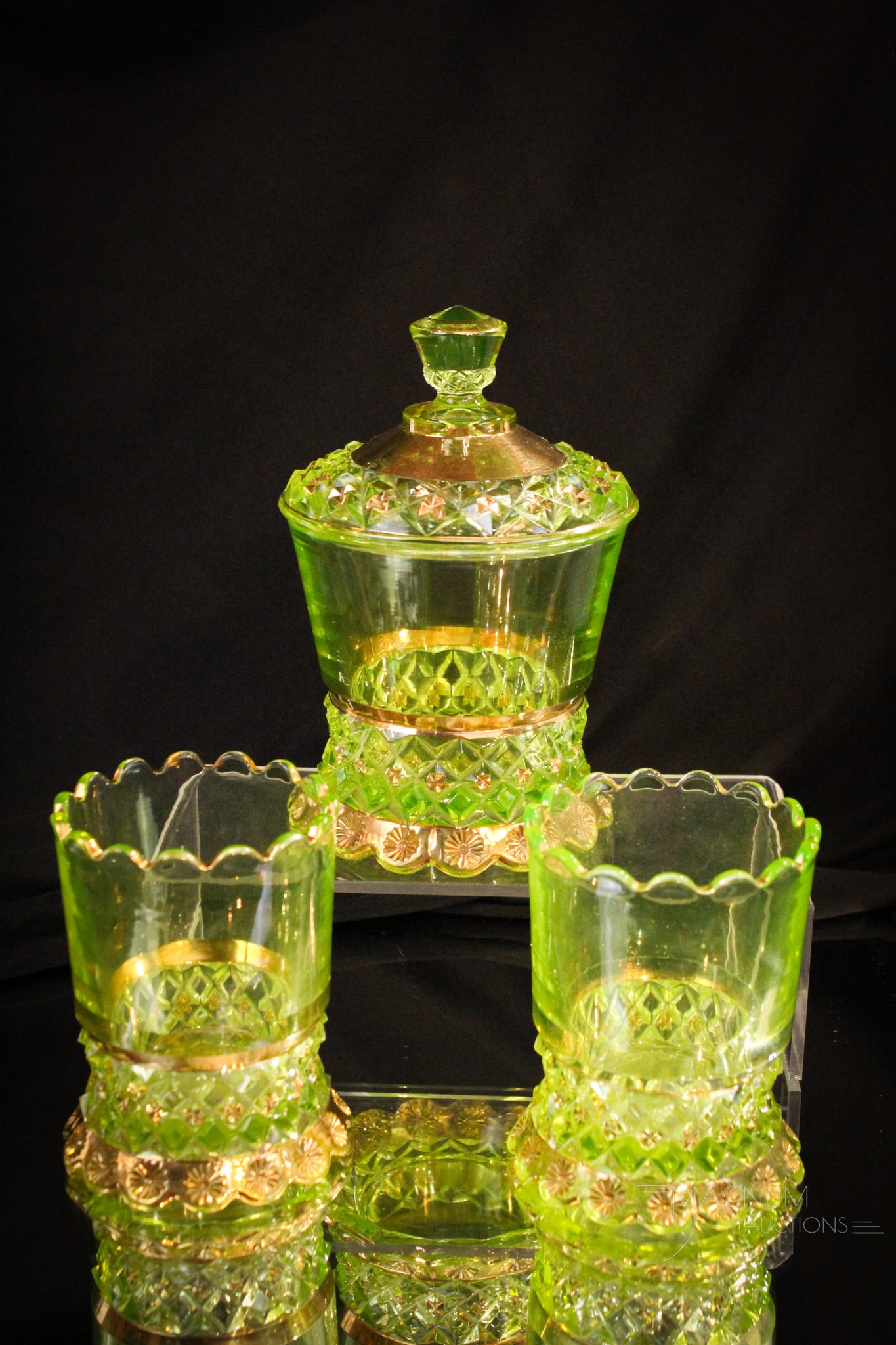 3 pc Lot Victorian Vaseline Riverside Petticoat Glass: Two spooners and a covered sugar bowl in the ever popular Petticoat pattern by Riverside Glass. Each to be adored. Tallest measures 6 1/2".
