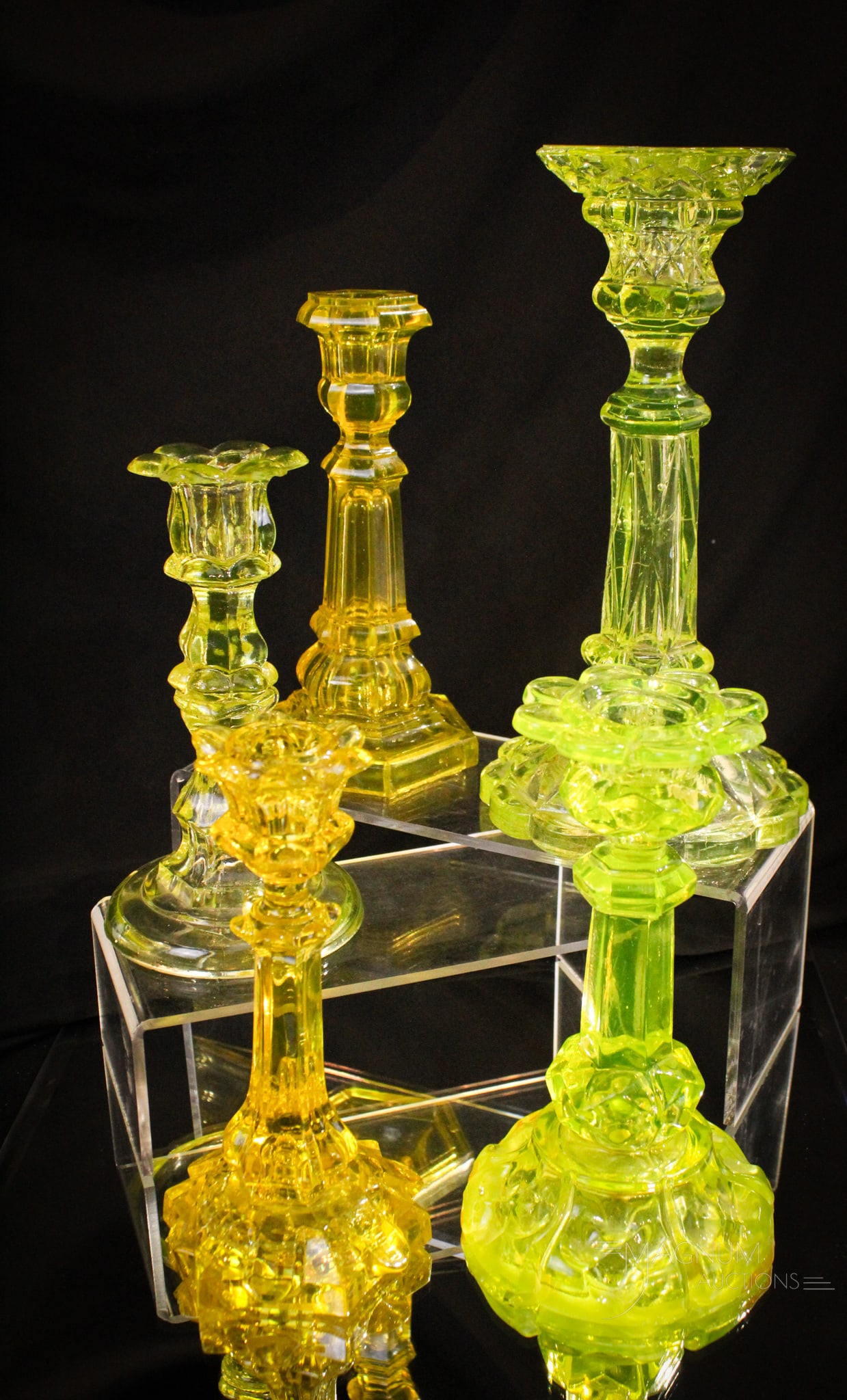 5 pc Lot Happy Family Vaseline Candlesticks: Nice assortment of candlesticks grouped together and like any family. All with issues except for one. The Pressed Diamond pattern example is in good shape. The remainder with some sort of apology. Lol