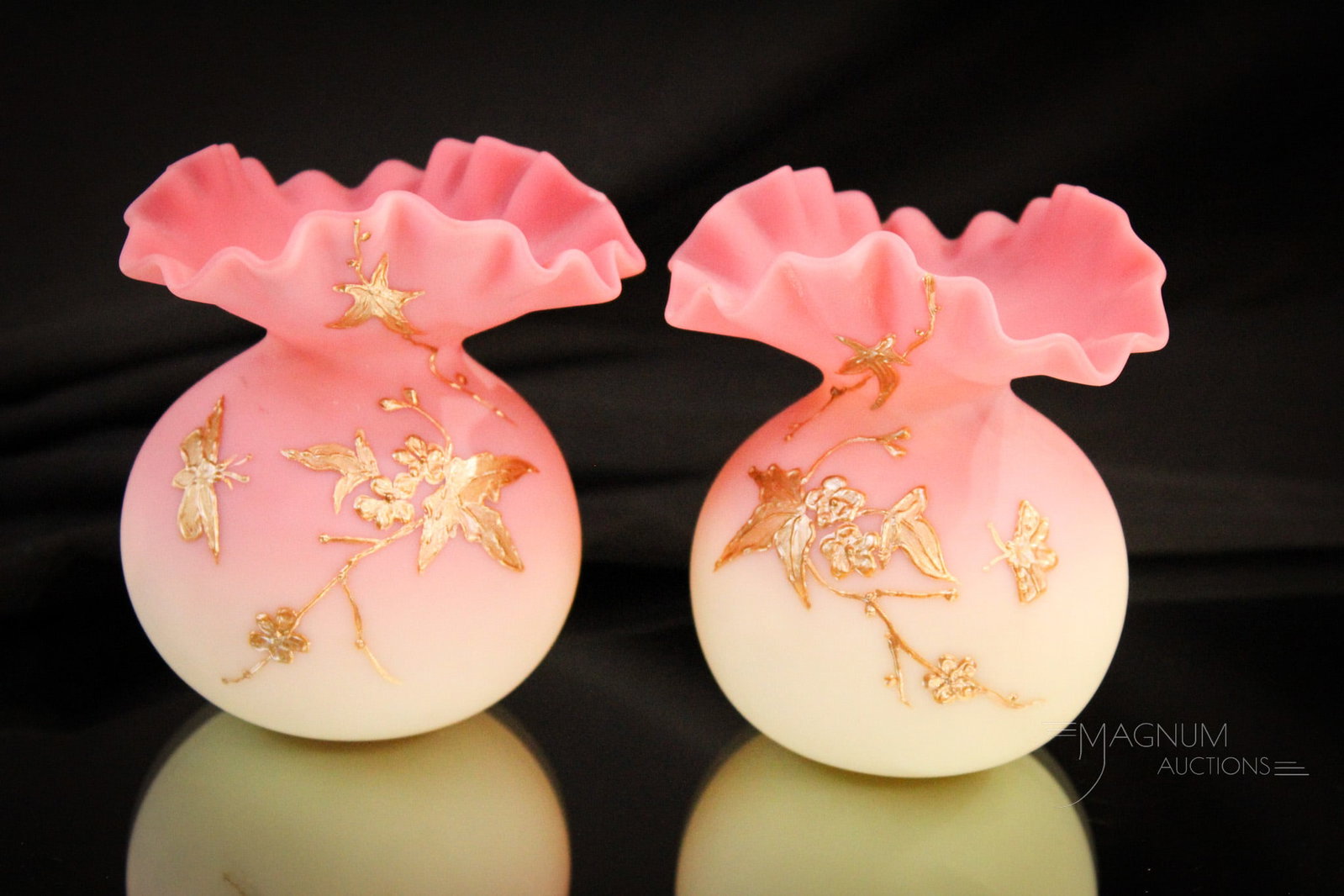 Pair Webb Burmese Victorian Glass Decorated Cabinet Vases: Fine form accentuates the desire to own these beautiful Webb burmese glass vases with additional and later added gilt decoration of bugs and florals. Each measures 3 1/2" tall.
