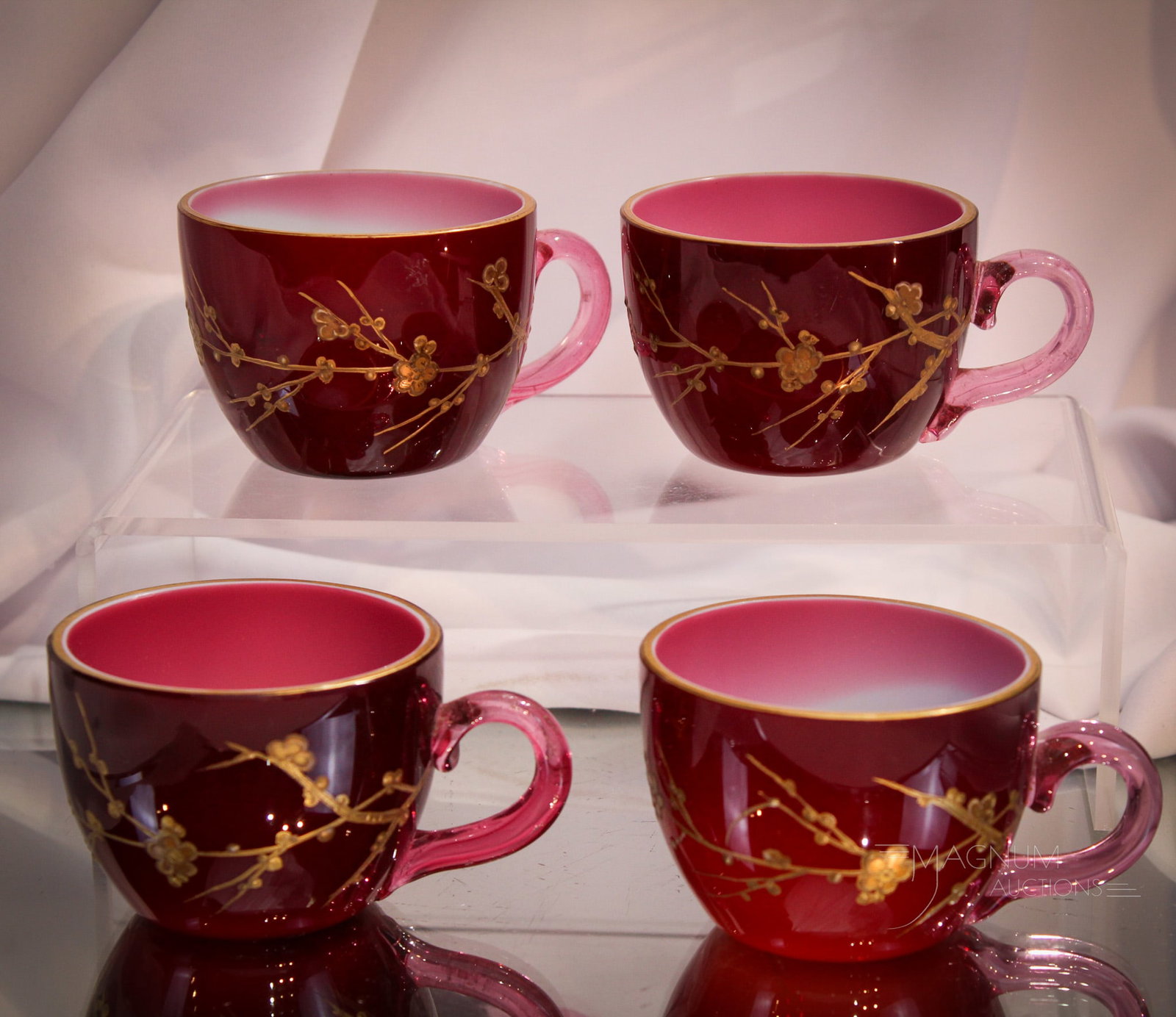 4 pc Lot signed Harrach Oxblood Gilt Punch Cups: Four seldom-ever-seen Victorian signed Harrach oxblood colored gilt decorated punch cups. Super coloring. Each measures 2 1/8" tall.
