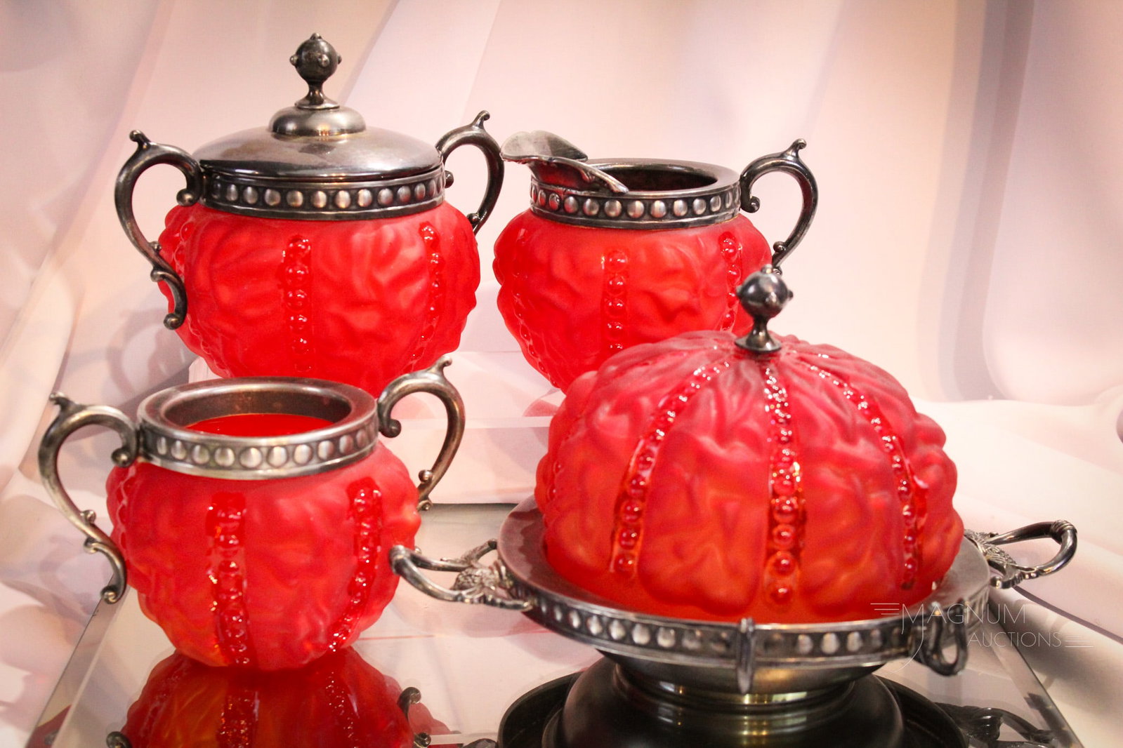 Benedict Silverplate Consolidated Beaded Drape Pigeon Blood Table Set: How nice is this complete Beaded Drape pattern table set? We think extremely! Seldom found in a complete set especially the butter with matching marked Benedict silverplate underplate with original li