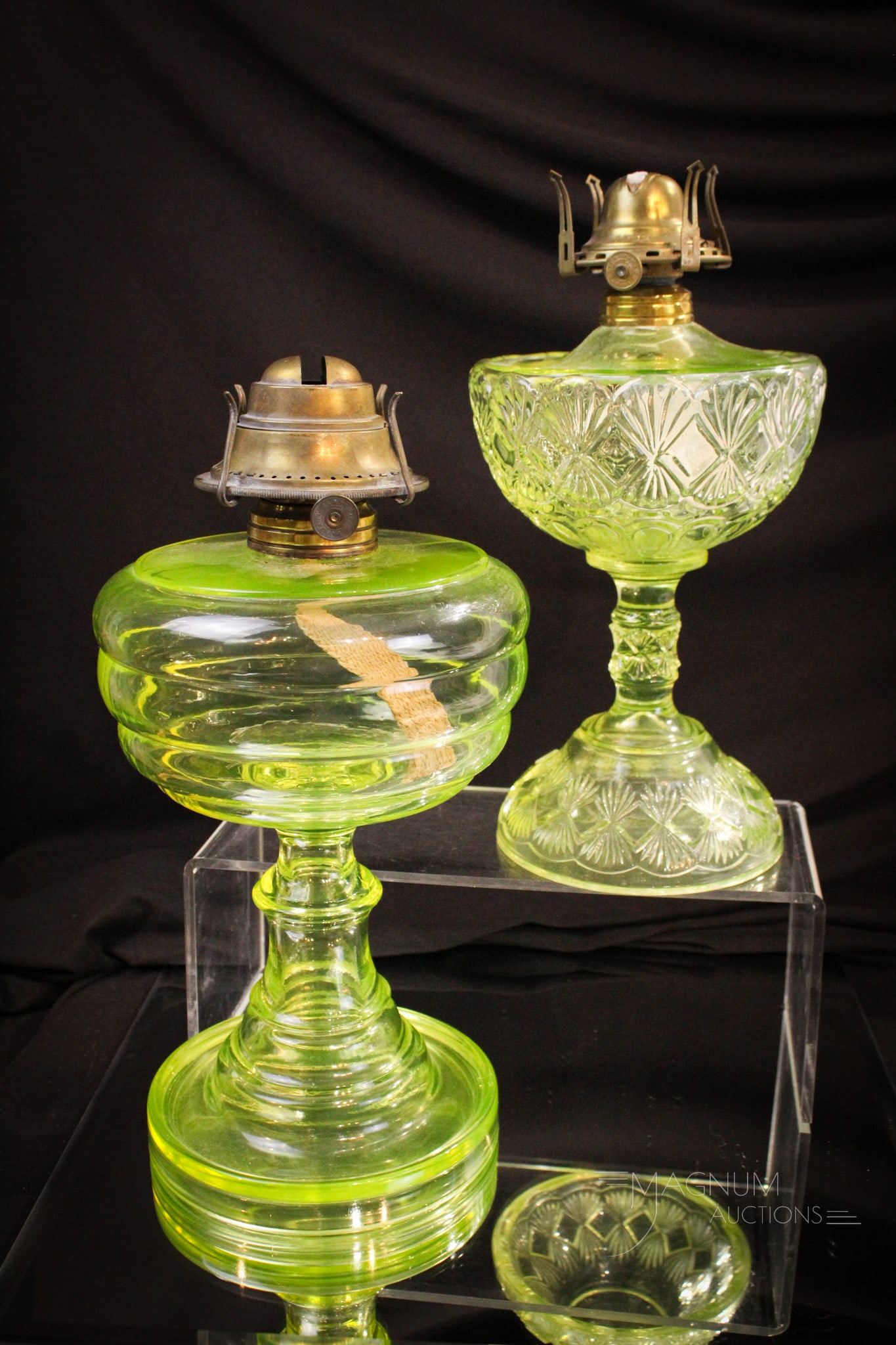 2 pc Lot Vaseline Patern Glass Victorian Oil Lamps: Two unique examples of Victorian vaseline pattern glass oil lamps. Tallest measures 9 1/2" for the glass portion only.
