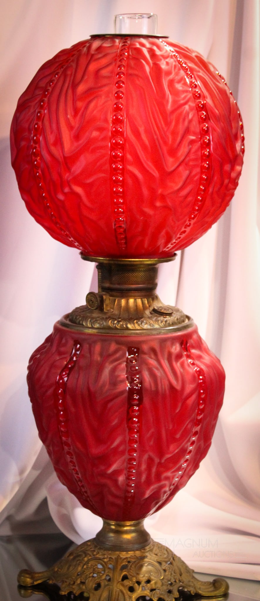 Victorian Red Satin Beaded Drape Gone with the Wind Oil Lamp: Marvelous red Satin Beaded Drape Victorian gone with the wind oil lamp. Lamp remains oil. Measures 25" tall.