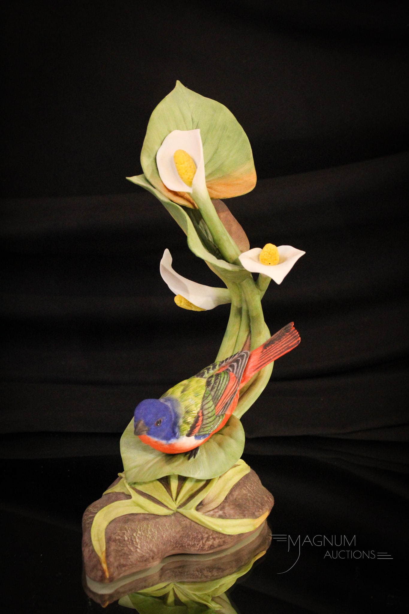 Boehm Bisque Porcelain Painted Bunting Bird Figurine: A signed Boehm Painted Bunting bisque porcelain bird figurine. This gem measures 10" tall, 5 1/2" wide.