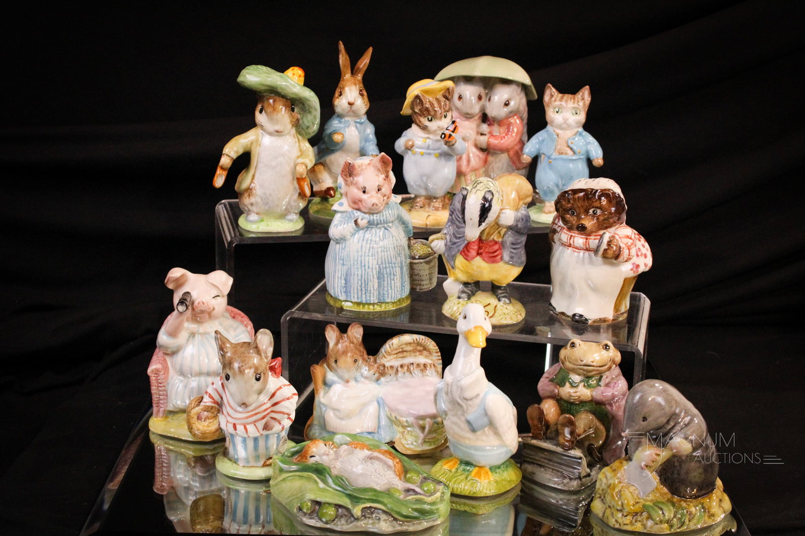 15 pc Lot Beatrix Potter Figurines: Great assembly of Beswick Porcelain Beatrix Potter figurines. Each unique. Early to later editions. Tallest measures 3 1/2".