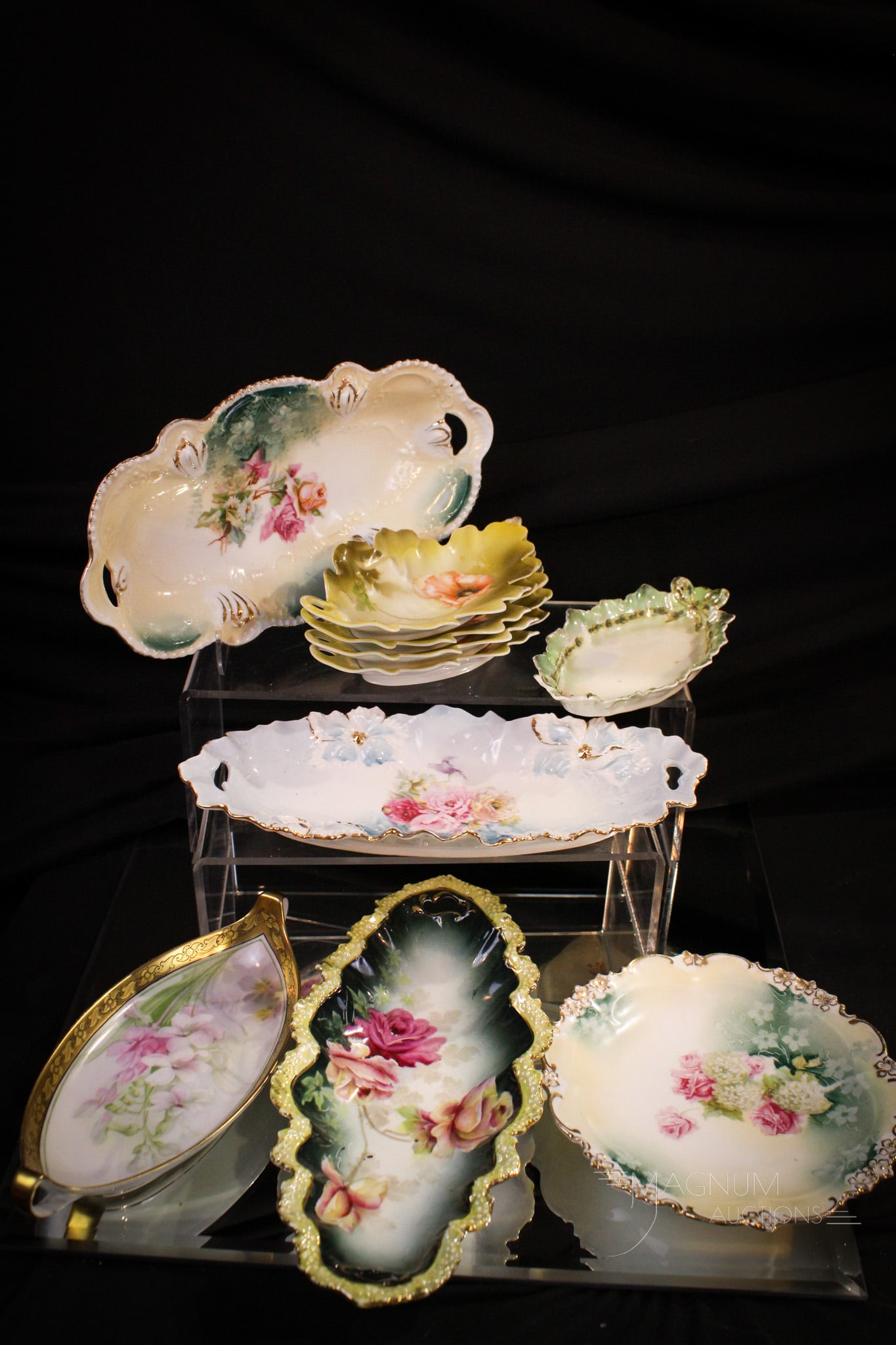 10 pc Lot Marked R.S. Prussia & Related Porcelain: Generous ten piece lot of marked R. S. Prussia and more. Included is three marked R.S. Prussia floral decorated oval pickle dishes, one R.S. Prussia marked pin dish, one marked R. S. Germany oval dish