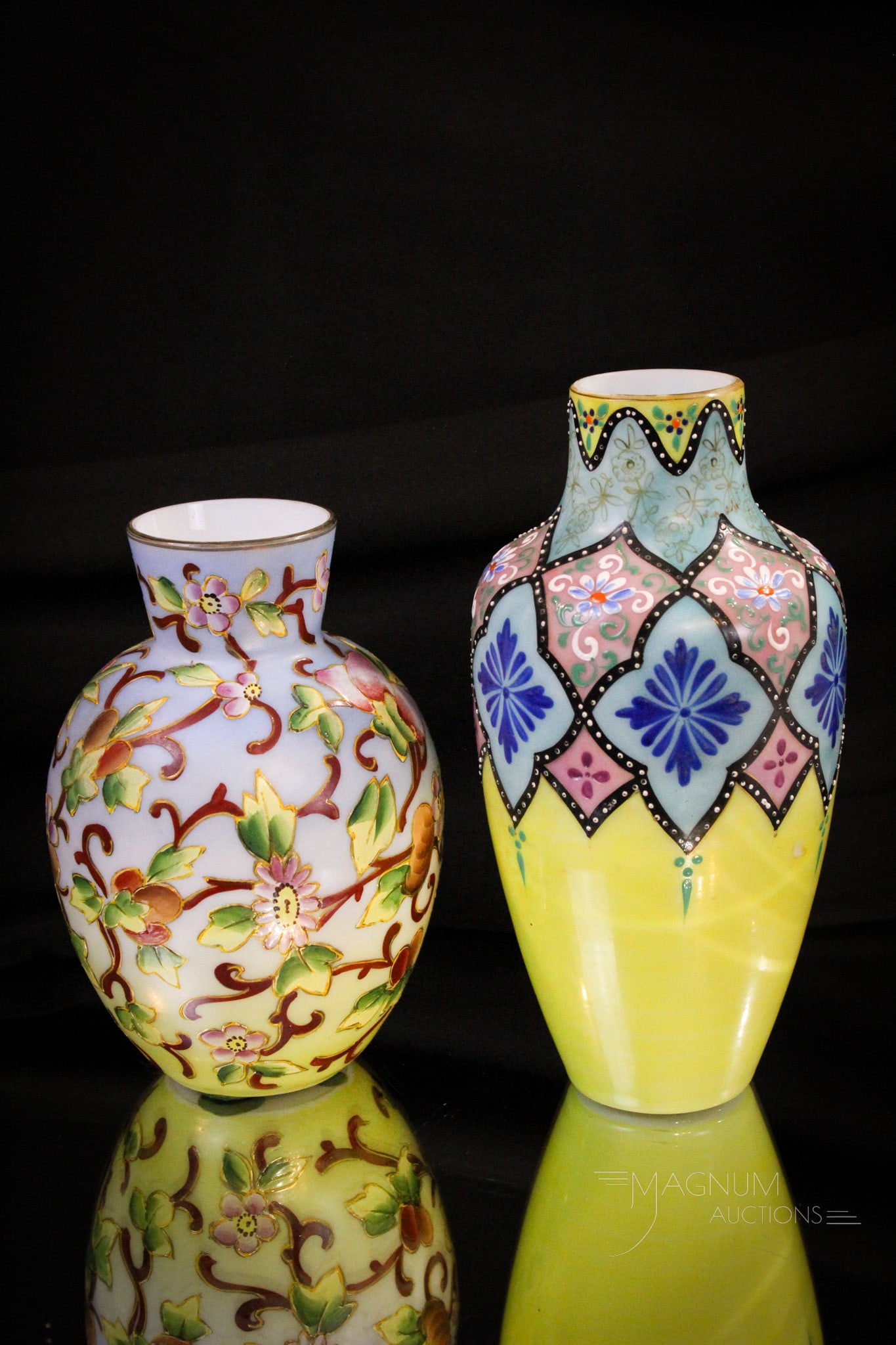 2 pc Lot Victorian Webb Moroccan Persian Enameled Glass Vases: Two fine examples of Webb or Harrach Moroccan or Persian decorated vases. One in yellow and blue, the other in pink and blue. Tallest measures 8".