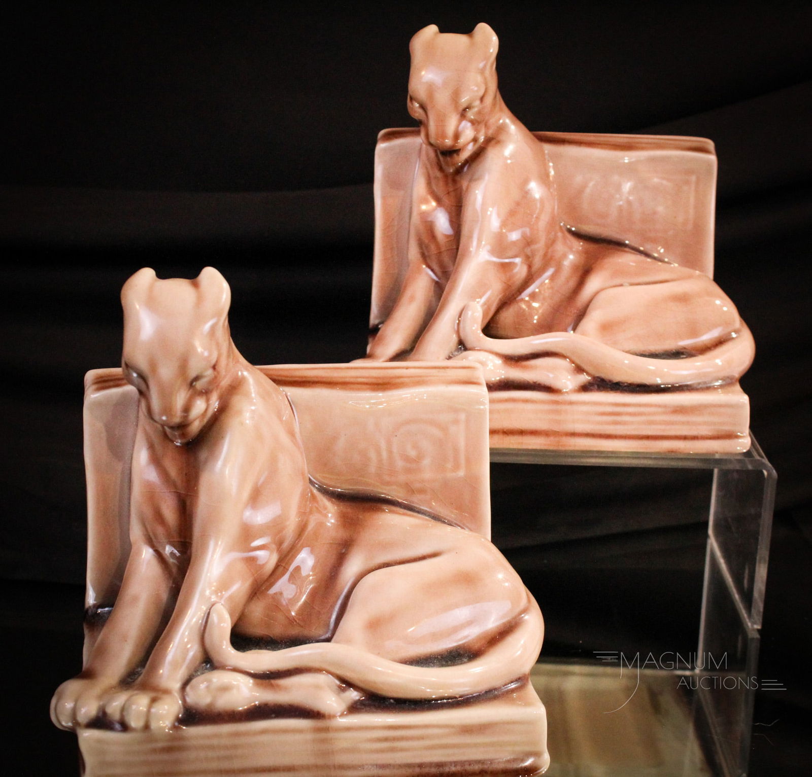 Pair Rookwood Pottery #2564 Panther Bookends: Select offering of a pair of signed #2564 "XLVII" Panther form bookends in light brown glaze. Each measures 5 3/4" tall.