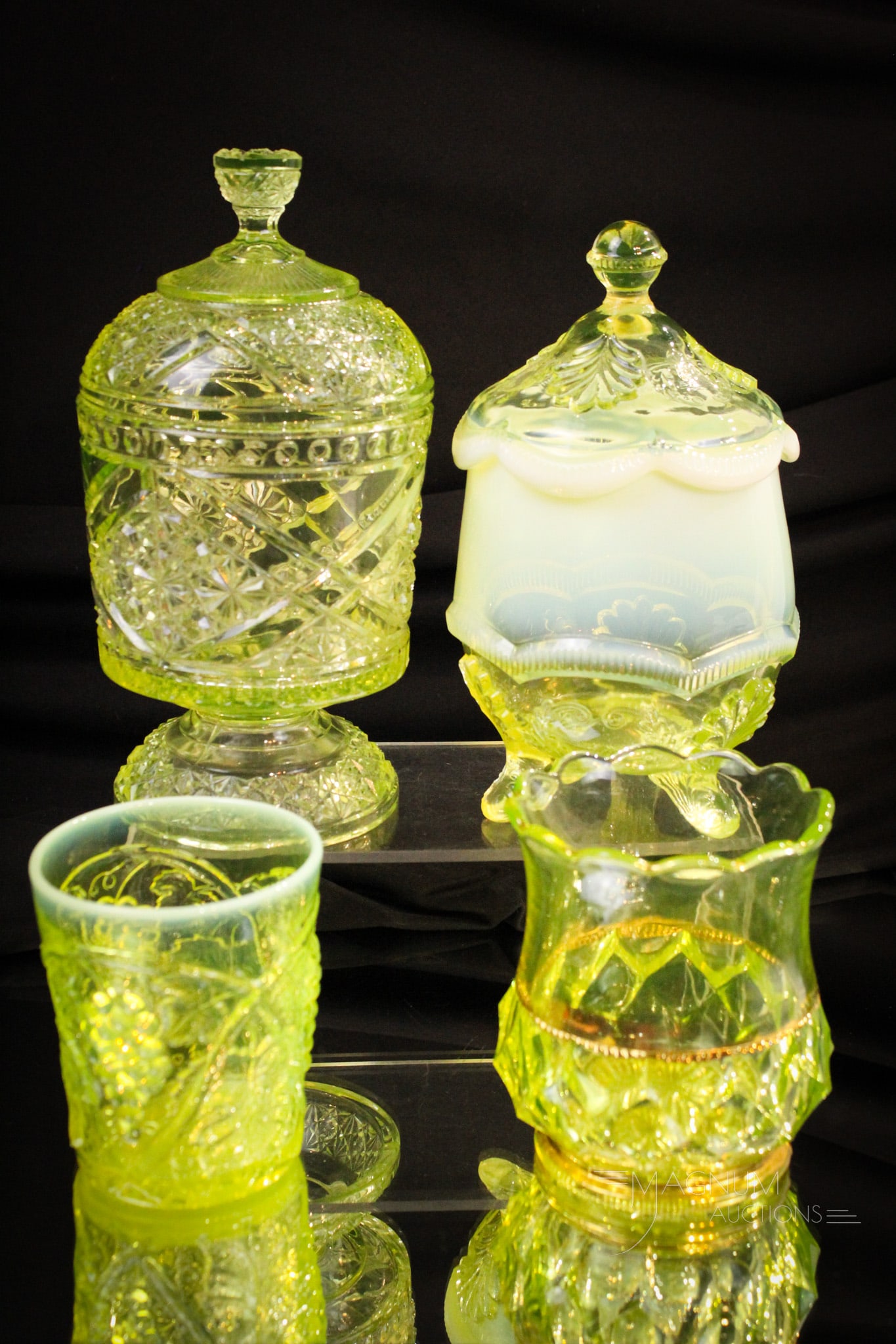 4 pc Lot Victorian Vaseline Pattern Glass: Select offering of four pieces of Victorian vaseline pattern glass: A Daisy with Crossbars covered sugar bowl, a Columbia pattern spooner with gilt decoration, a Palm Beach opalescent tumbler. All thi