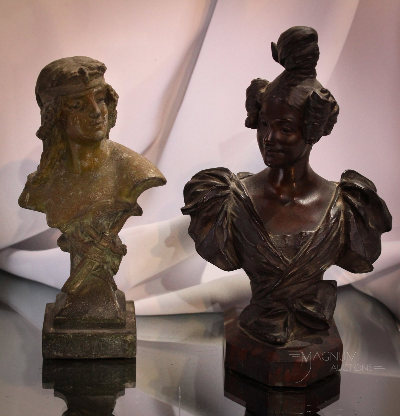 2 pc Lot Art Nouveau Bronze Bust & More: A lovely Art Nouveau female bronze bust on red marble base. Signed and dated. This along with a spelter bust titled "Judith". Tallest measures 7 1/4".