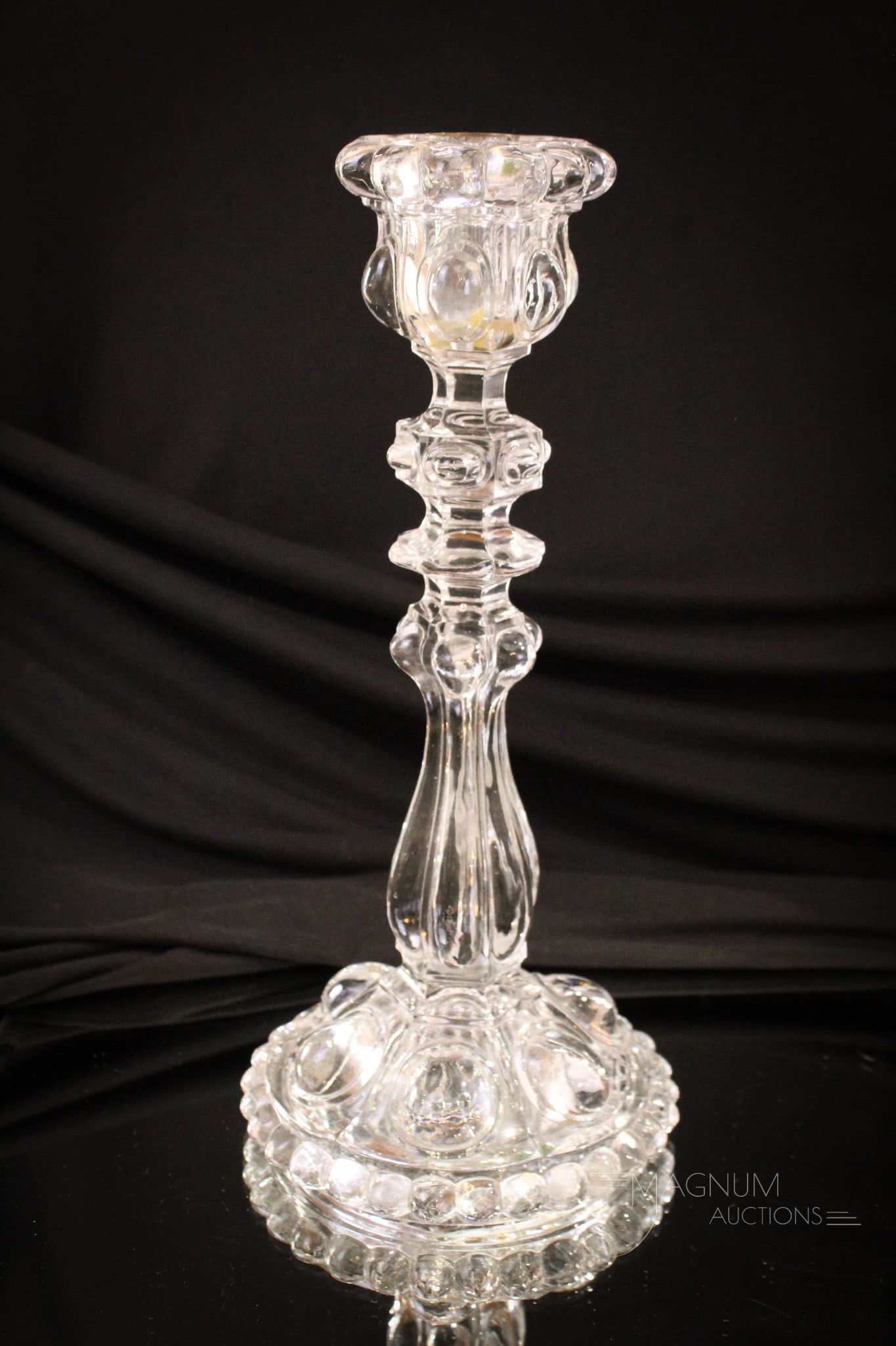 Clear Baccarat Glass Candlestick: Beautiful French Baccarat glass candlestick. Piece measures 11 3/4" tall.