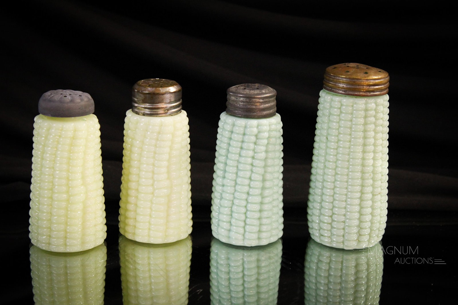 4 pc Lot Corn Cob Maize Victorian Glass Shakers: Select offering of four Victorian glass corn cob maize pattern shakers. A pair of custard along with 2 different sized milk glass in green.