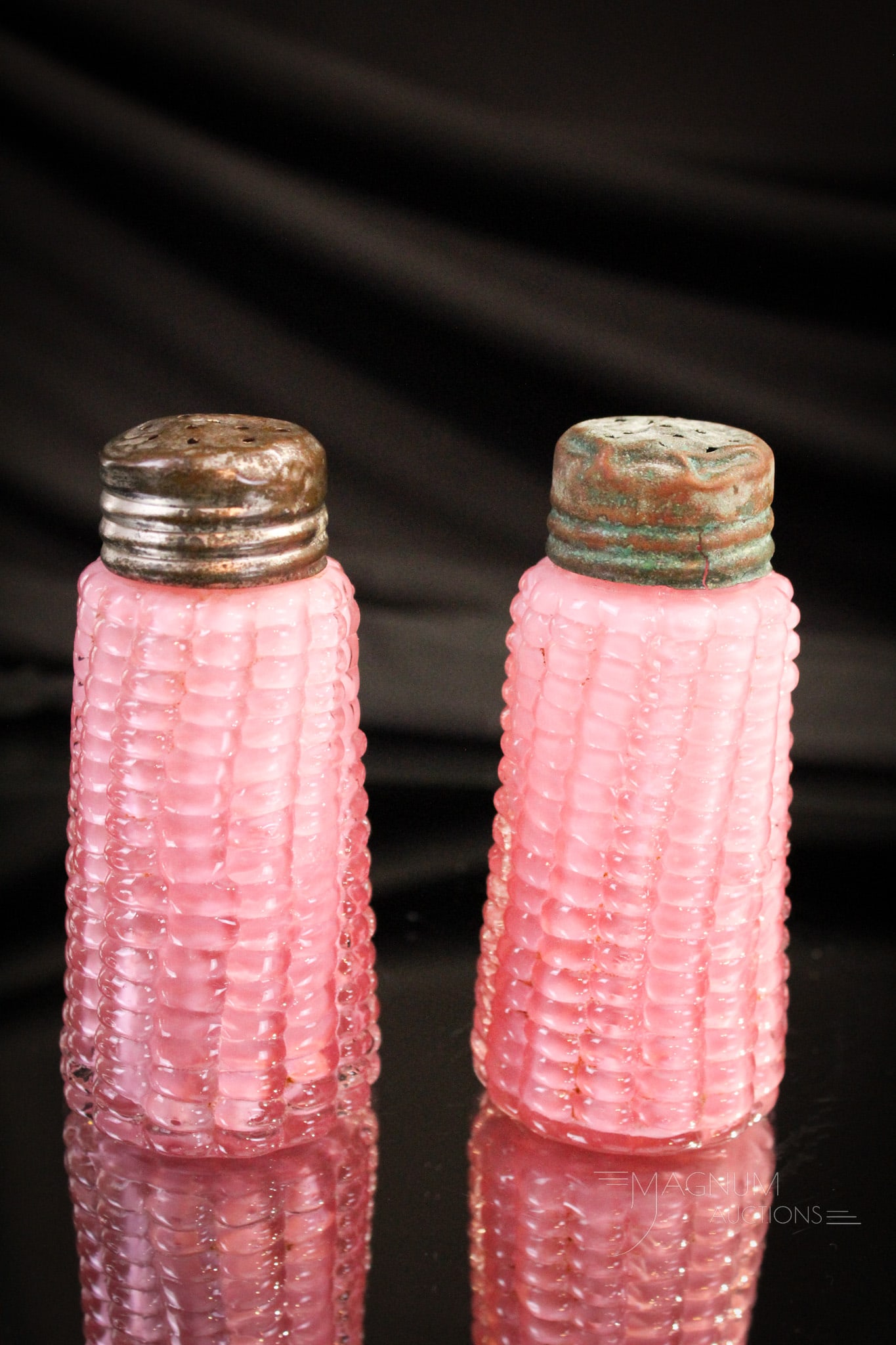 Pair Pink Cased Corn Cob Victorian Glass Maize Shakers: Select offering of two pink cased Victorian shakers in the corn cob Maize pattern. Each measures 3 1/2" tall.