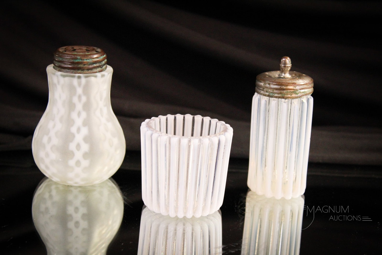 3 pc Lot Opalescent Victorian Consolidated & Beatty Shakers & Toothpick: Three select offerings in opalescent glass. A single Consolidated Criss Cross pattern satin shaker. This along with a Beatty rib shaker and toothpick. Tallest measures 3 1/4".