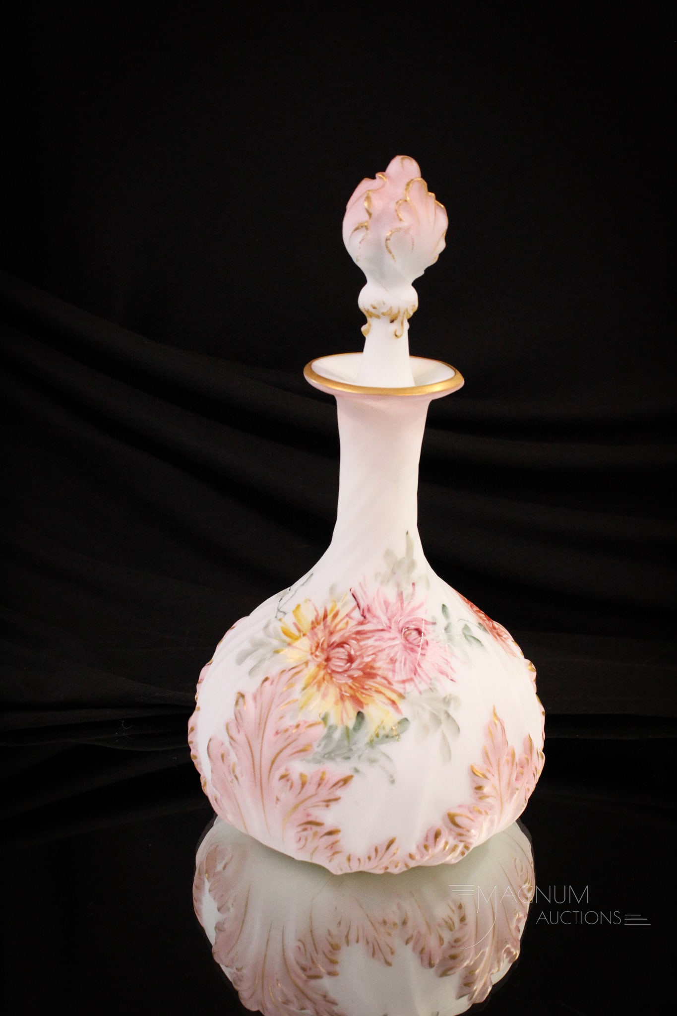Mt. Washington Pairpoint Victorian Glass Dresser Cologne Bottle: A bounty of chrysanthemums decorate this wonderful Mt. Washington Pairpoint cologne bottle with matching stopper. It stands 10 1/2" tall.