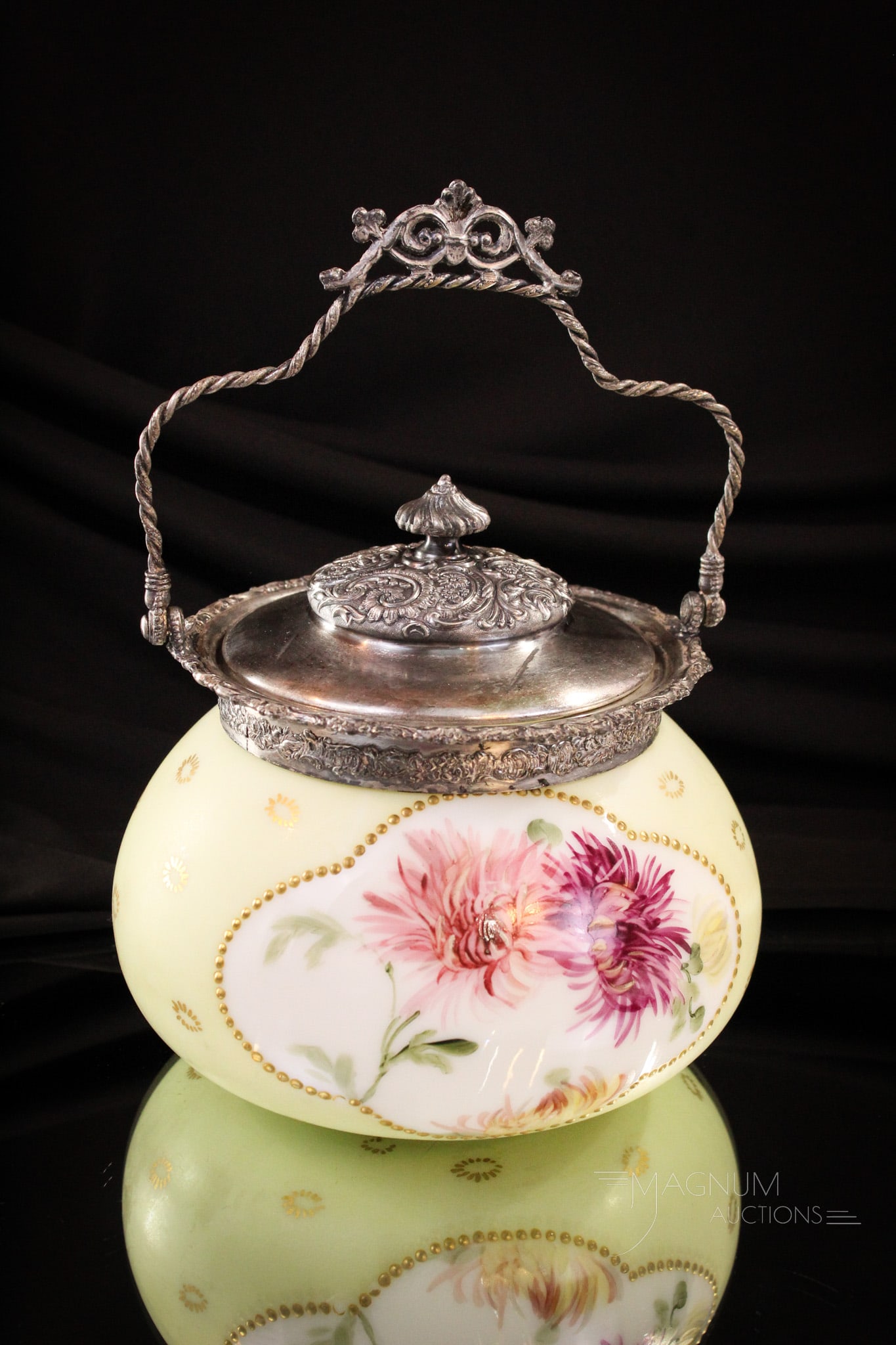 Signed Pairpooint Victorian Glass Chrysanthemum Biscuit Jar: Chrysanthemums were a favorite in the Victorian era just as they are today. This lovely signed piece of Pairpoint glass and silverplate is decorated with just those in pinks and purples. It measures 6