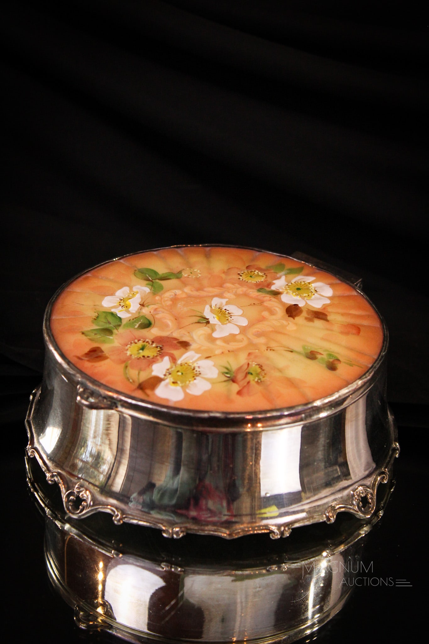 Pairpoint Silverplate & Glass Victorian Dresser Box: A wonderful and seldom-found Victorian dresser box with silverplate body and glass hand painted insert in lid. A fine piece of Pairpoint from the gilded age. It measures 2" tall, 6" diameter.