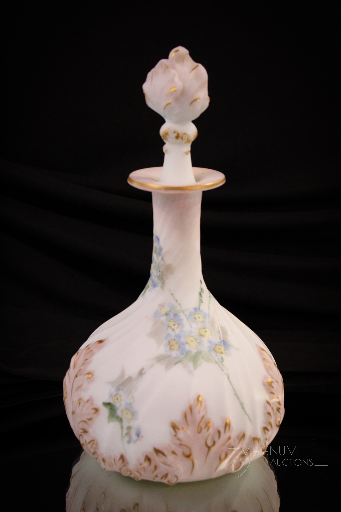 Mt. Washington Pairpoint Victorian Glass Dresser Cologne Bottle: A super example of the wares by Mt. Washington Glass. This dresser or cologne bottle has fine delicate florals of hawthorne flowers and foliage. This comes complete with original matching stopper. It