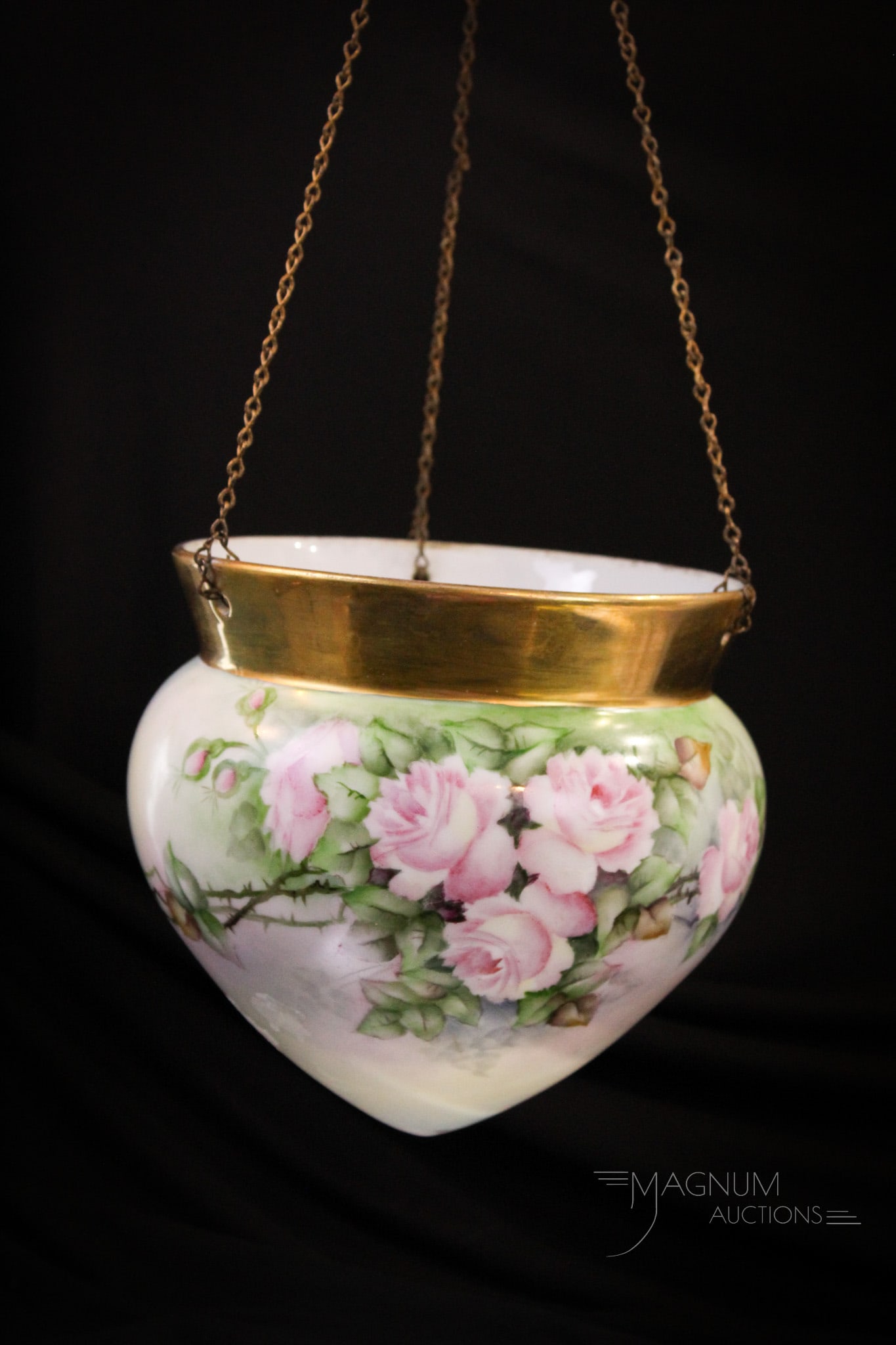 Limoges Pink Rose Hand Painted Porcelain Hanging Planter: Fine hand painted porcelain hanging planter decorated with delicate pretty pink roses and gilt embellishments. Planter potion measures 7" tall, 7 1/2" wide.
