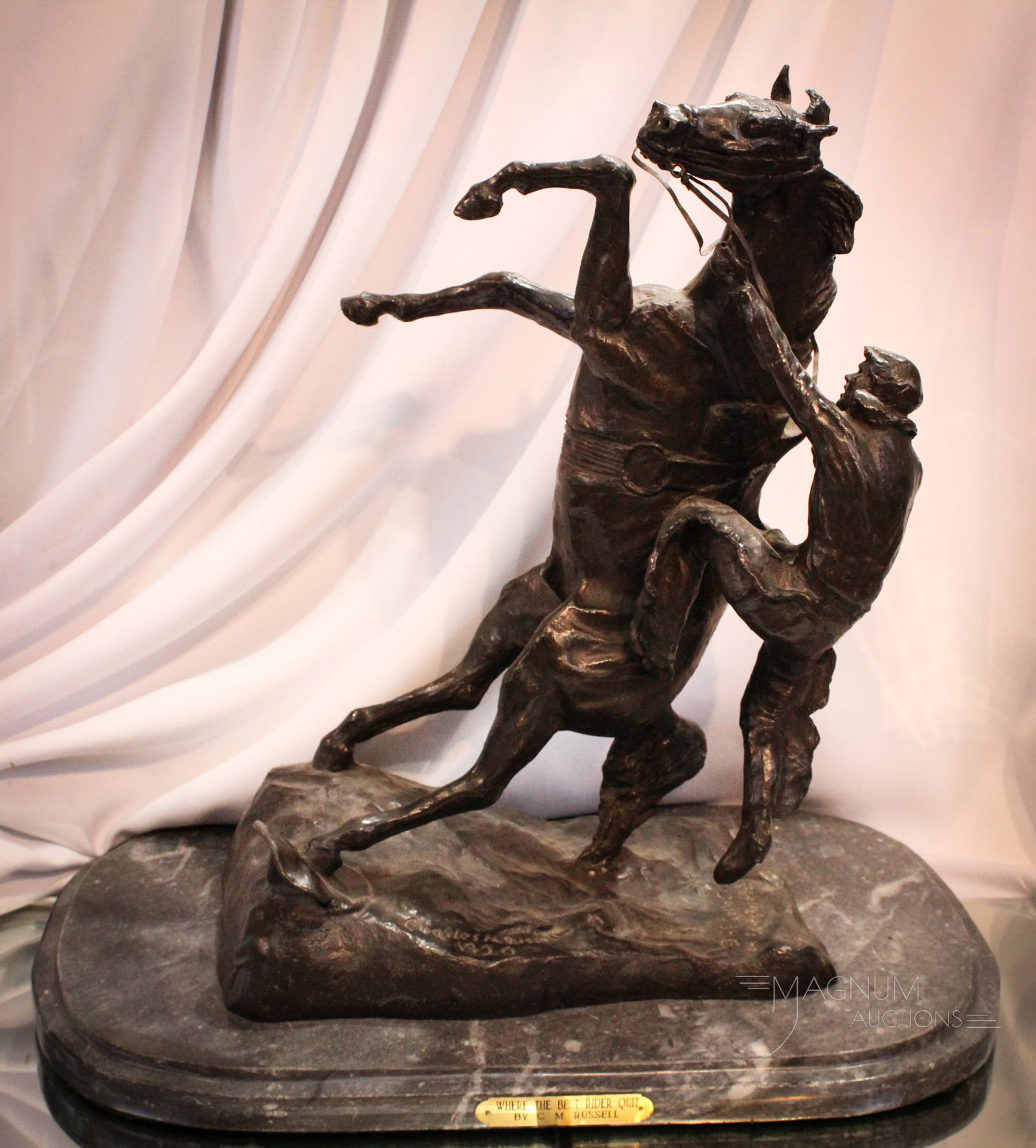 After, Charles Marion Russell (1864-1926) Bronze: Fine example of an after Charles Russell (American, 1864-1925) circa 1920 bronze titled, "Where the Best Rider Quit". Bronze complete on marble base. Measures approximately 21" by 21".