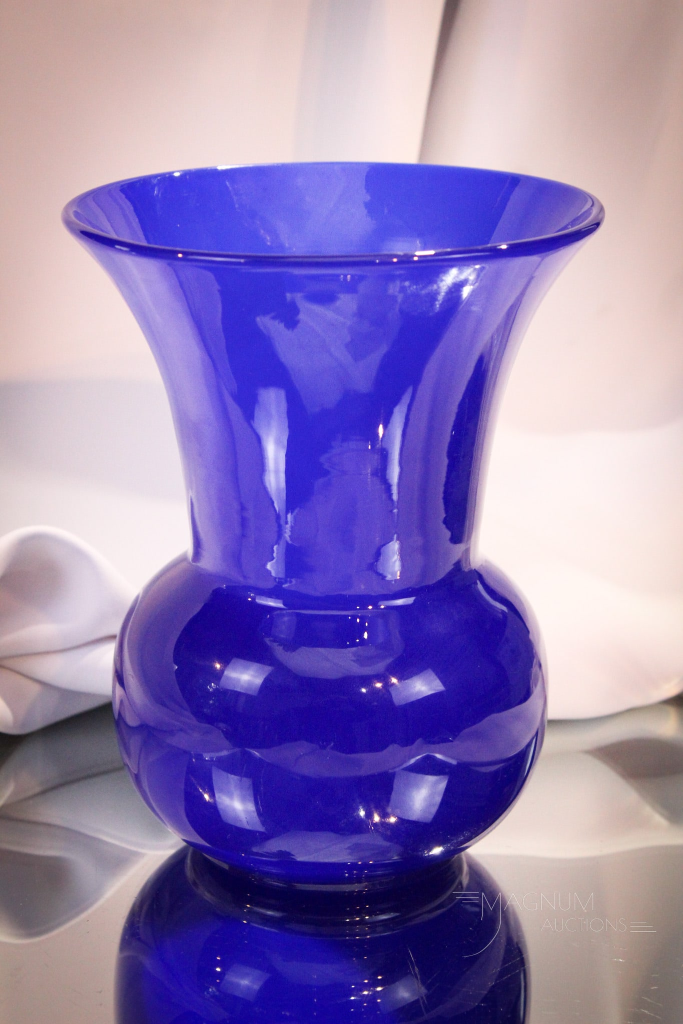 Steuben Dark Blue Jade Glass Vase: Nice coloring to this Steuben dark blue jade vase. Piece measures 8" tall.