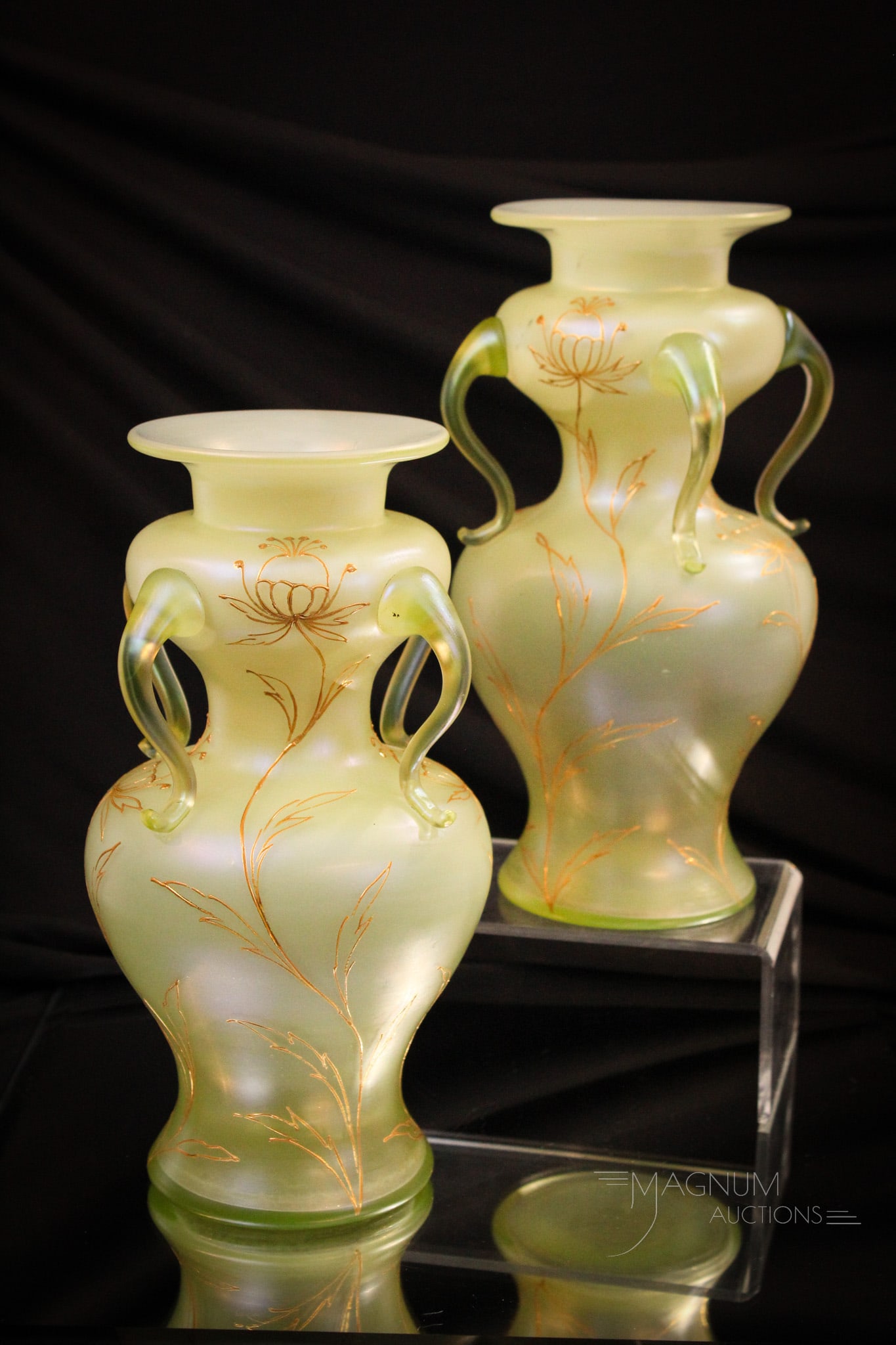Pair Loetz Arcadia 4-Handle Uranium Glass Enameled Vases: Fine offering here of a matched pair of Loetz Arcadia four handle gilt and enameled vases. Each vase with uranium content to the glass as they glow.