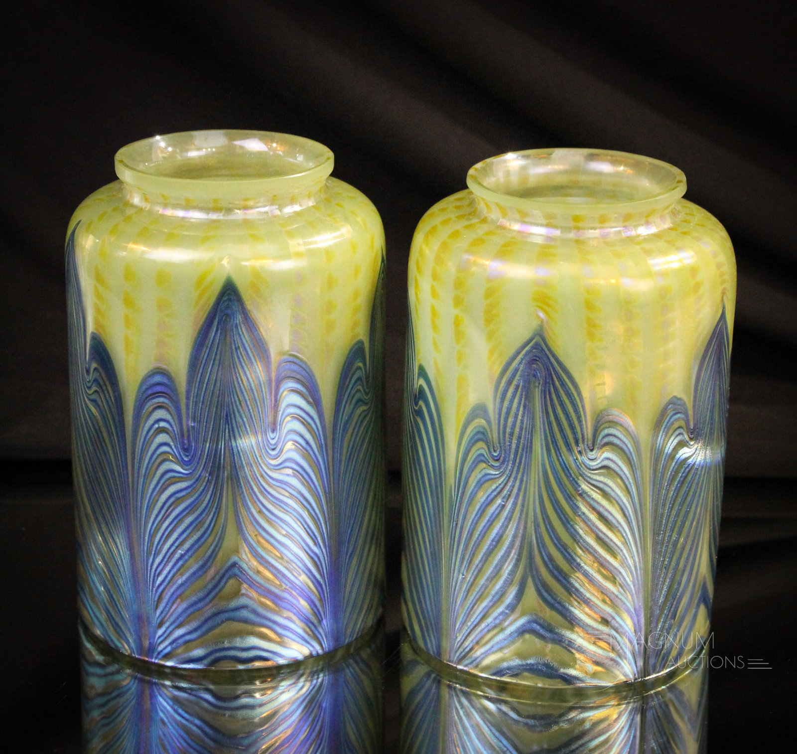 Pair Loetz PG 2/187 circa 1902 Glass Shades: Two matched examples of Loetz PG 2/187 glass shades, circa 1902. Each measures 5" tall, 3 1/4" wide. Each with a 2 1/8" fitter rim.