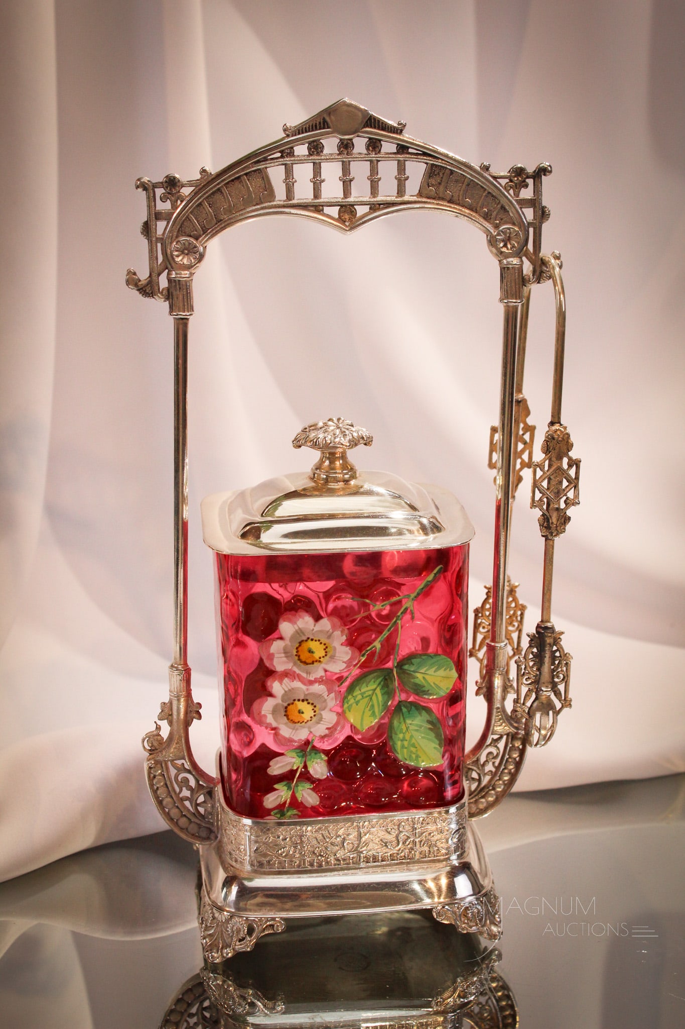 Webster Silverplate Victorian Rectangular Cranberry Enameled Pickle Castor: One of the finest pickle castors. This being a cranberry enameled Victorian rectangular jar enameled with plums. This set in signed Webster silverplate frame. A museum worthy piece! Measures 11 1/2" t