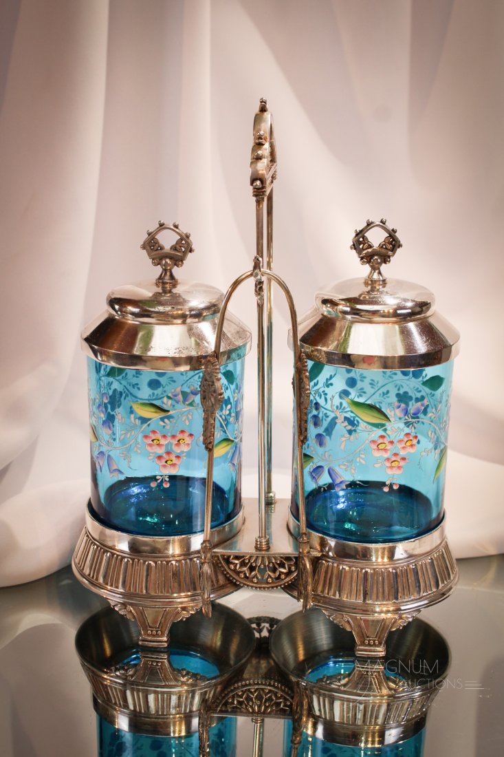 Rare Meriden Victorian Blue Enameled Double Silverplate Pickle Castor: Such a rare find! This a double peacock blue enameled Victorian pair of pickle jars set in signed Meriden silverplate frame. Double castor is complete with matching lids. One to make sure you own for 