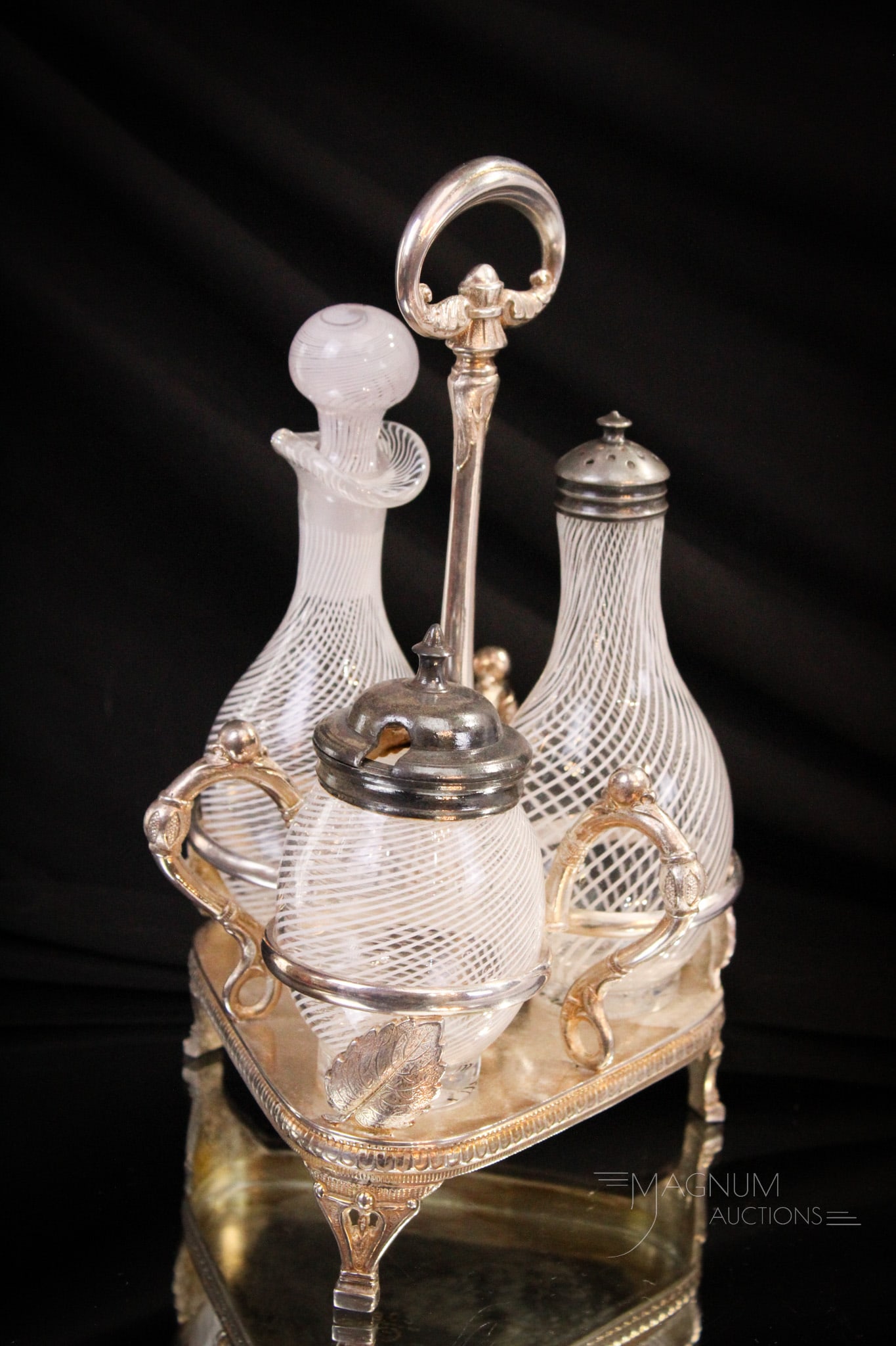 Hartford Victorian Silverplate Ribbon Swirl Victorian Condiment Castor: Fine find in this signed Hartford Victorian silverplate three piece condiment castor. Bottles are all ribbon glass. Complete set stands 9" tall.