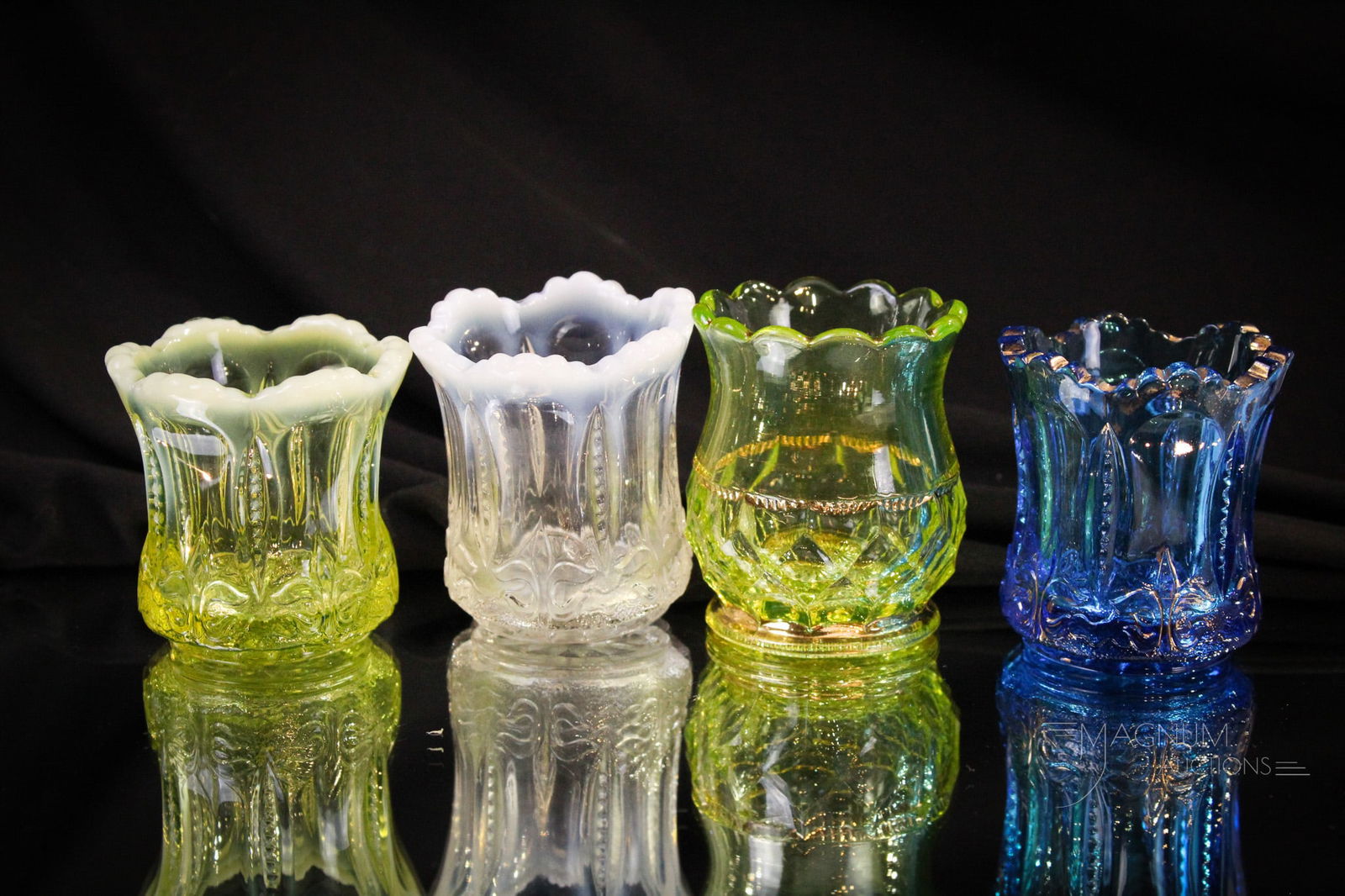 4 pc Lot Victorian Toothpick Holder Vaseline Columbia & Jefferson: Select offering of four Victorian toothpick holders. Three examples of Jefferson Iris with Meander in various colors. These along with a vaseline Columbia pattern. Tallest measures 2 3/4".