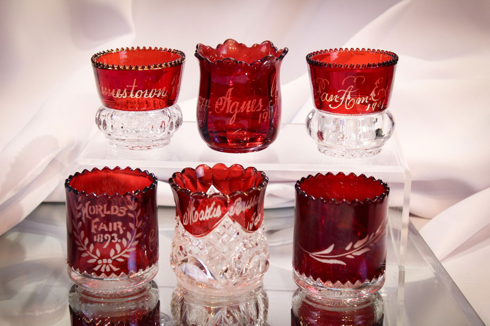 6 pc Lot Ruby Stained Victorian Toothpick Holders: Five of the ruby stained toothpicks in this lot are souvenired. One is not. Tallest measures 2 1/2".