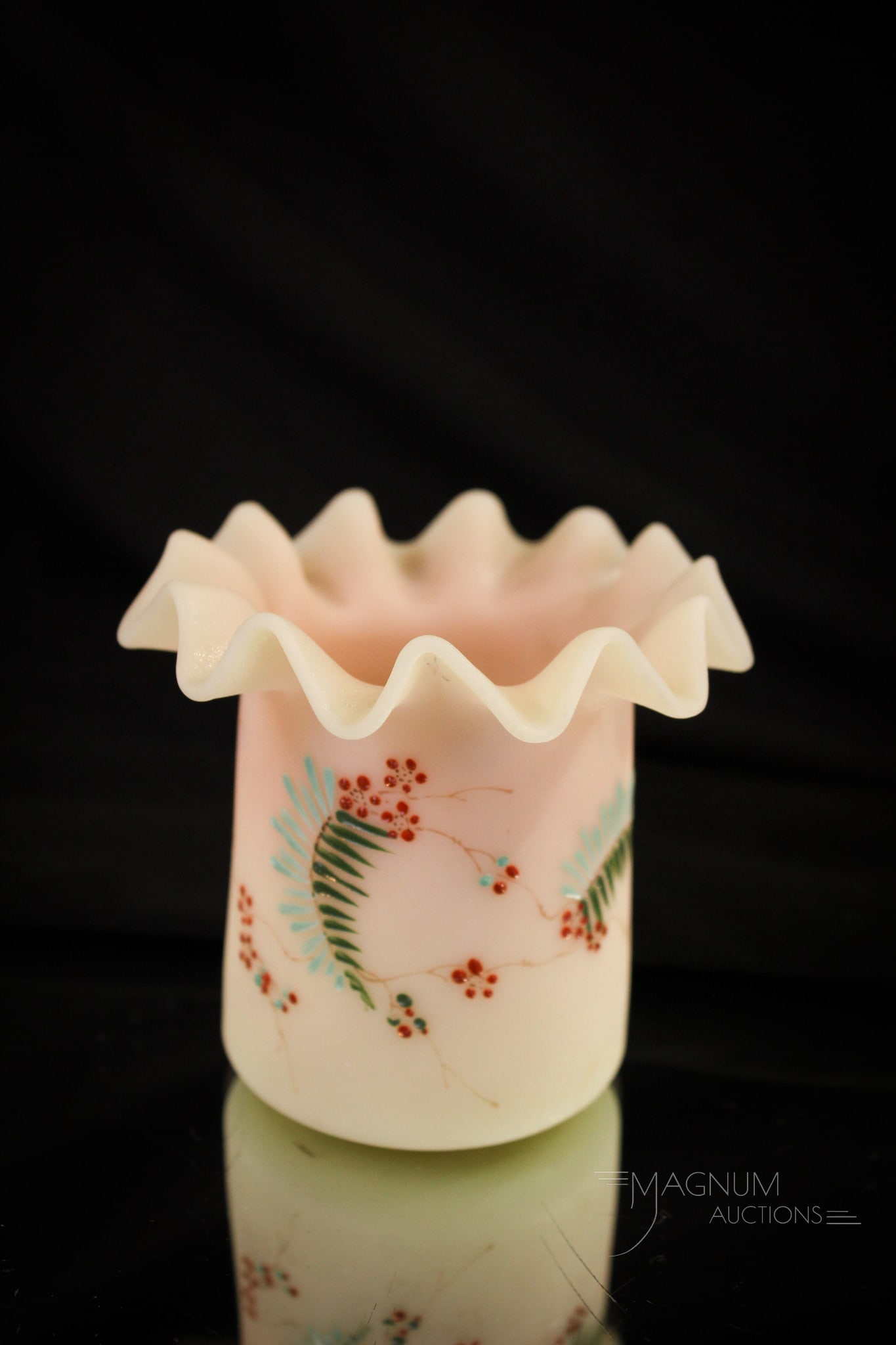 Mt. Washington Burmese Victorian Glass Toothpick Holder: Fine offering of a Victorian Mt. Washington burmese glass toothpick holder with ferns and flowers adorning it. Measures 2 1/2" tall.