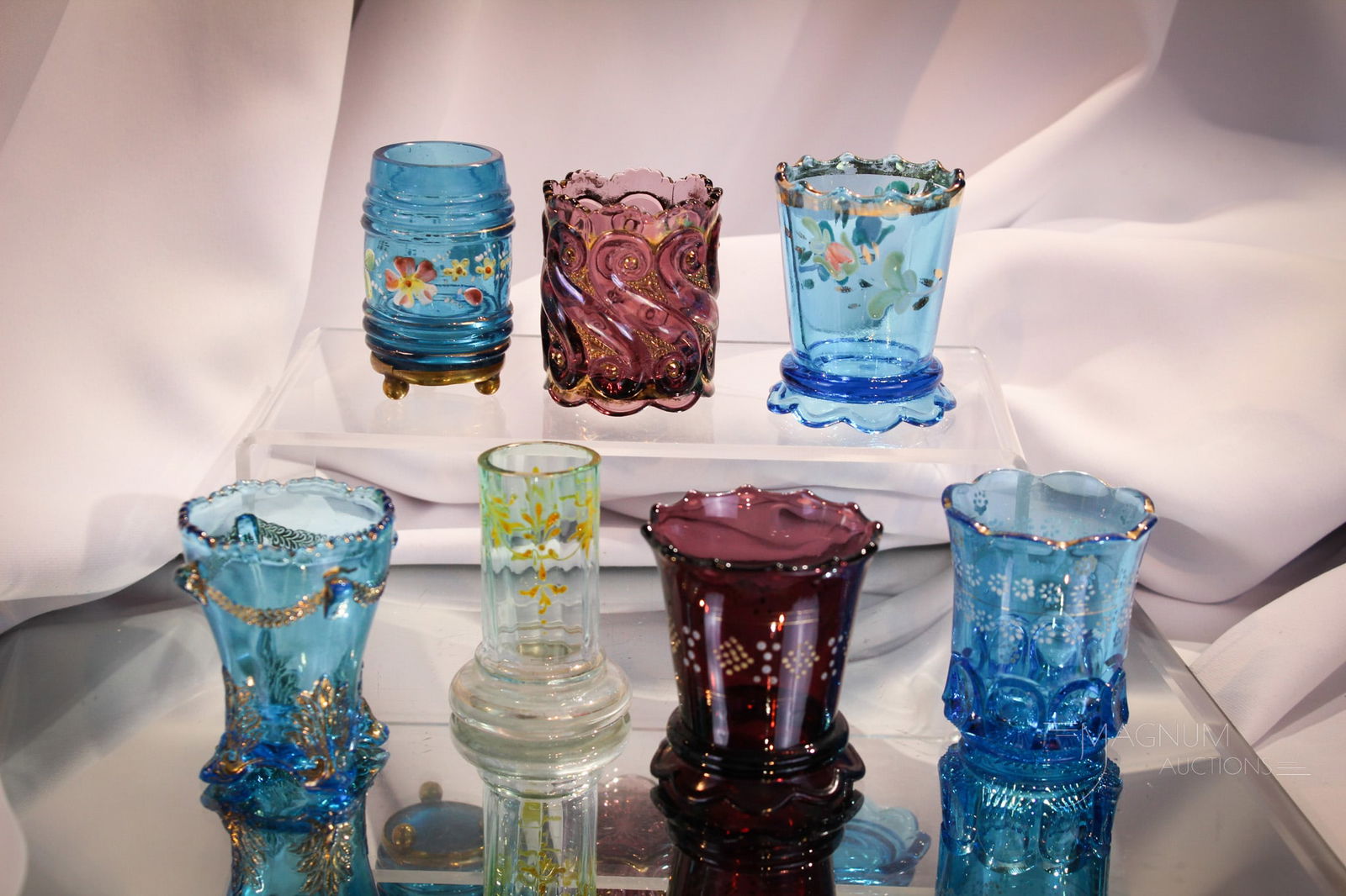 7 pc Lot Decorated Victorian Glass Toothpick Holders: Nice array of Victorian glass toothpick holders. All decorated to some degree. Tallest measures 2 3/4".